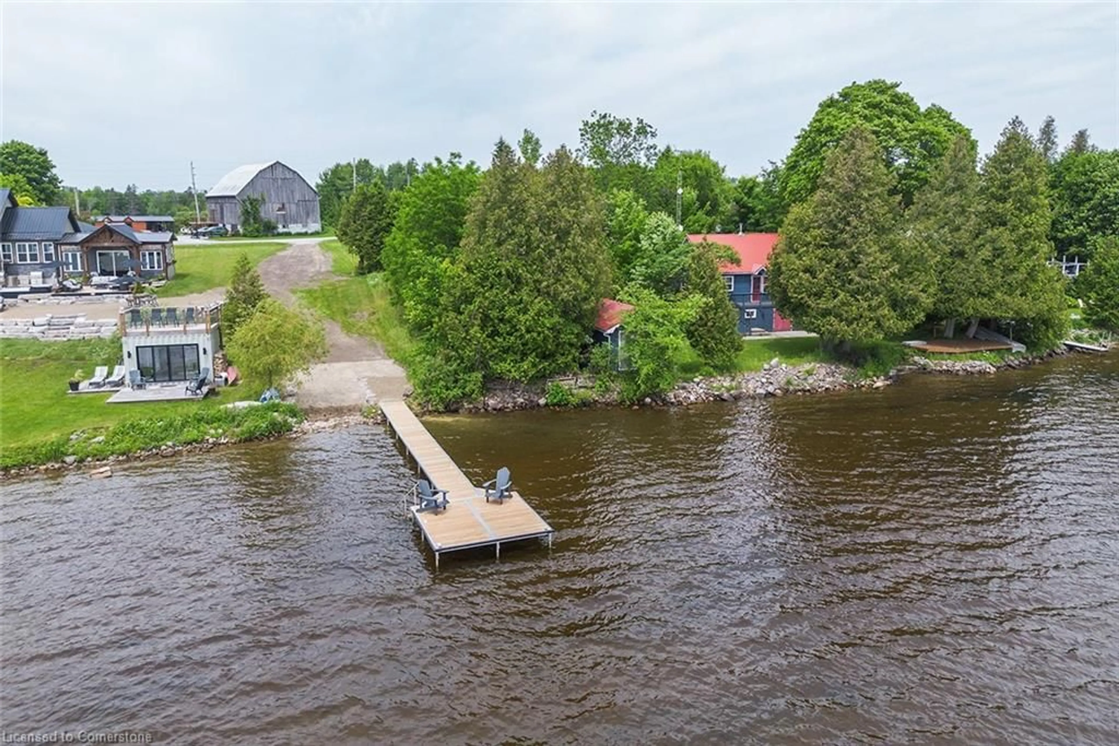 A pic from outside/outdoor area/front of a property/back of a property/a pic from drone, water/lake/river/ocean view for 31 Blue Bay Lane, Fenelon Falls Ontario K0M 1N0