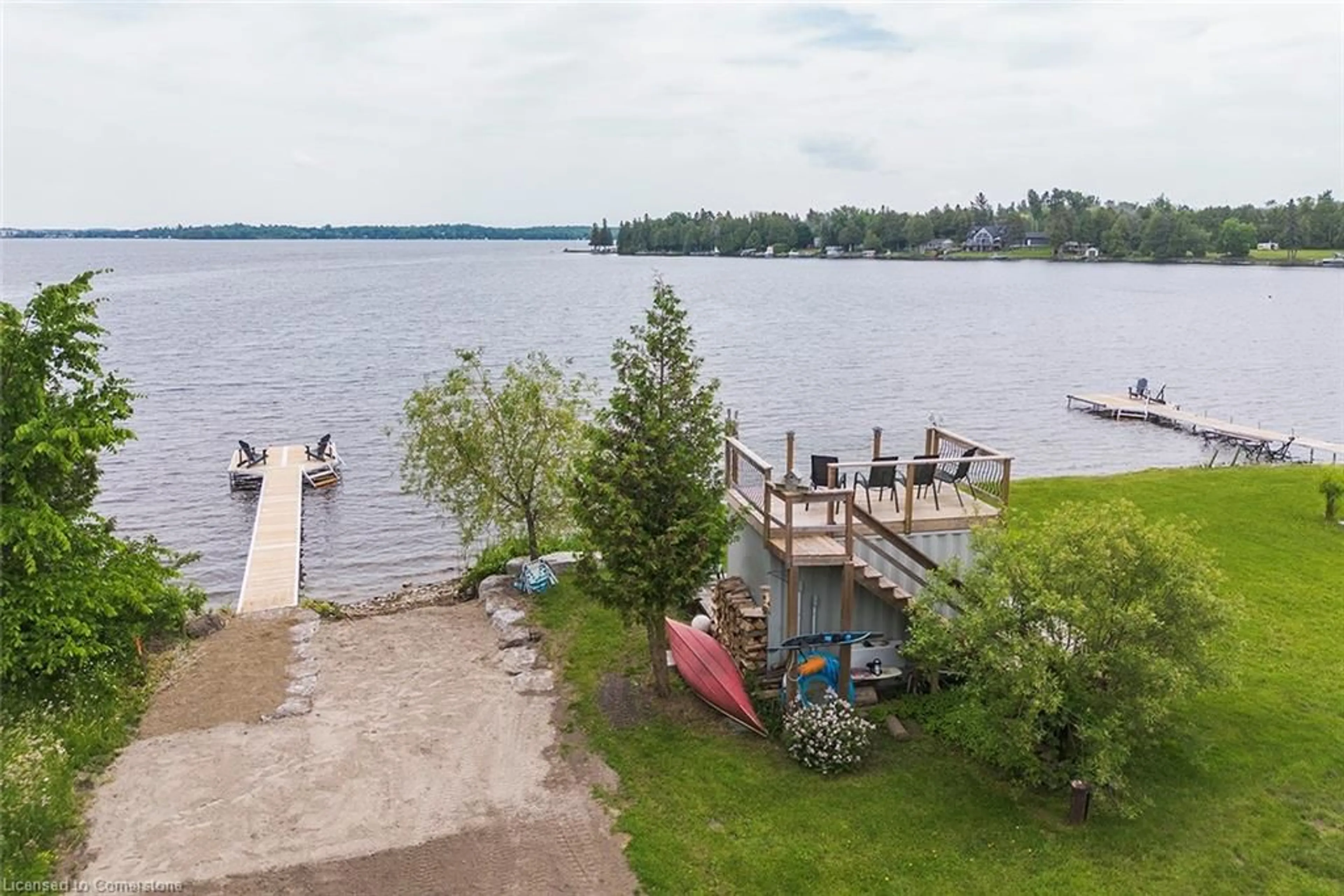 A pic from outside/outdoor area/front of a property/back of a property/a pic from drone, water/lake/river/ocean view for 31 Blue Bay Lane, Fenelon Falls Ontario K0M 1N0