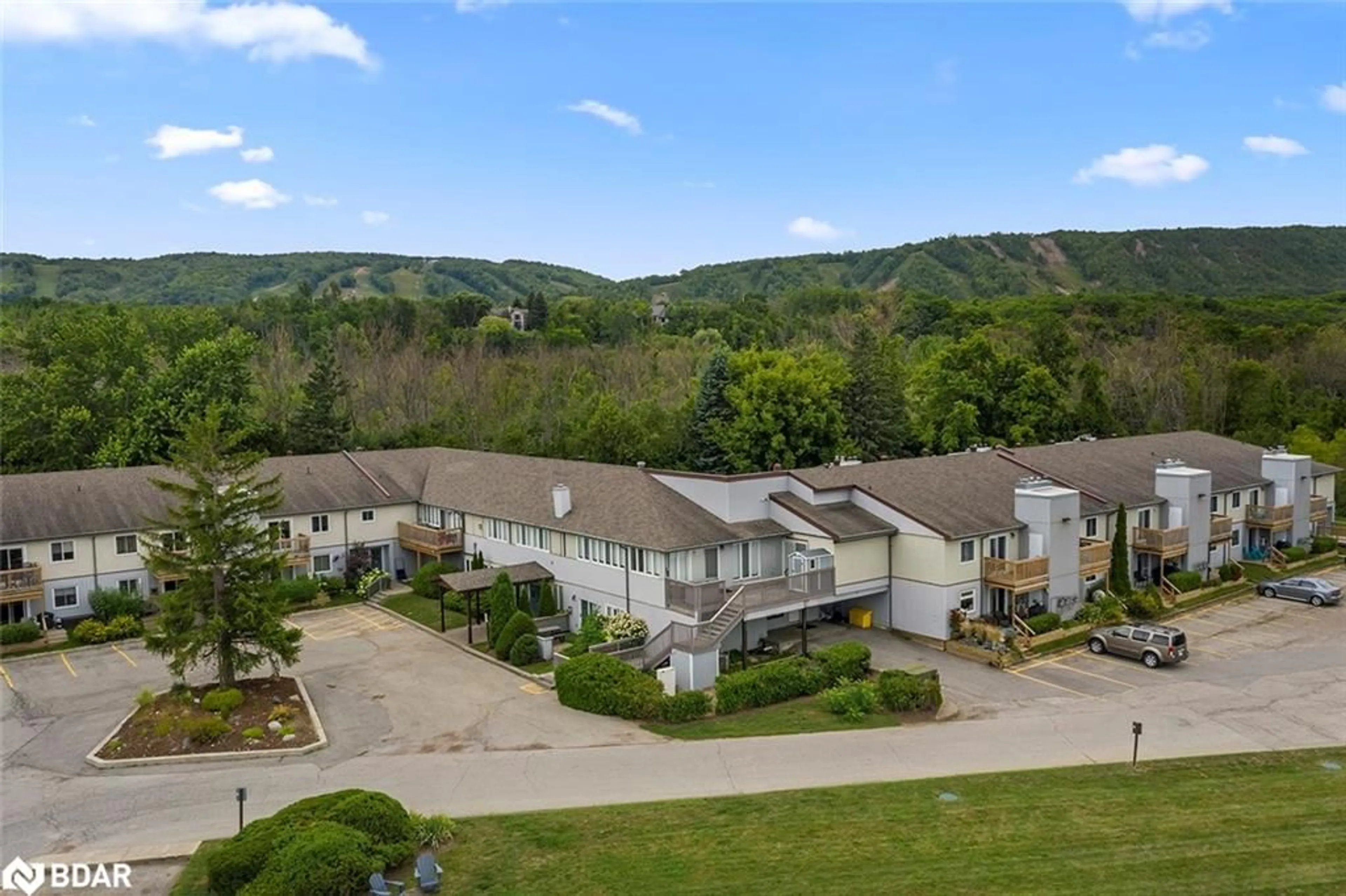 A pic from outside/outdoor area/front of a property/back of a property/a pic from drone, mountain view for 209472 26 Hwy #54, The Blue Mountains Ontario L9Y 0V3