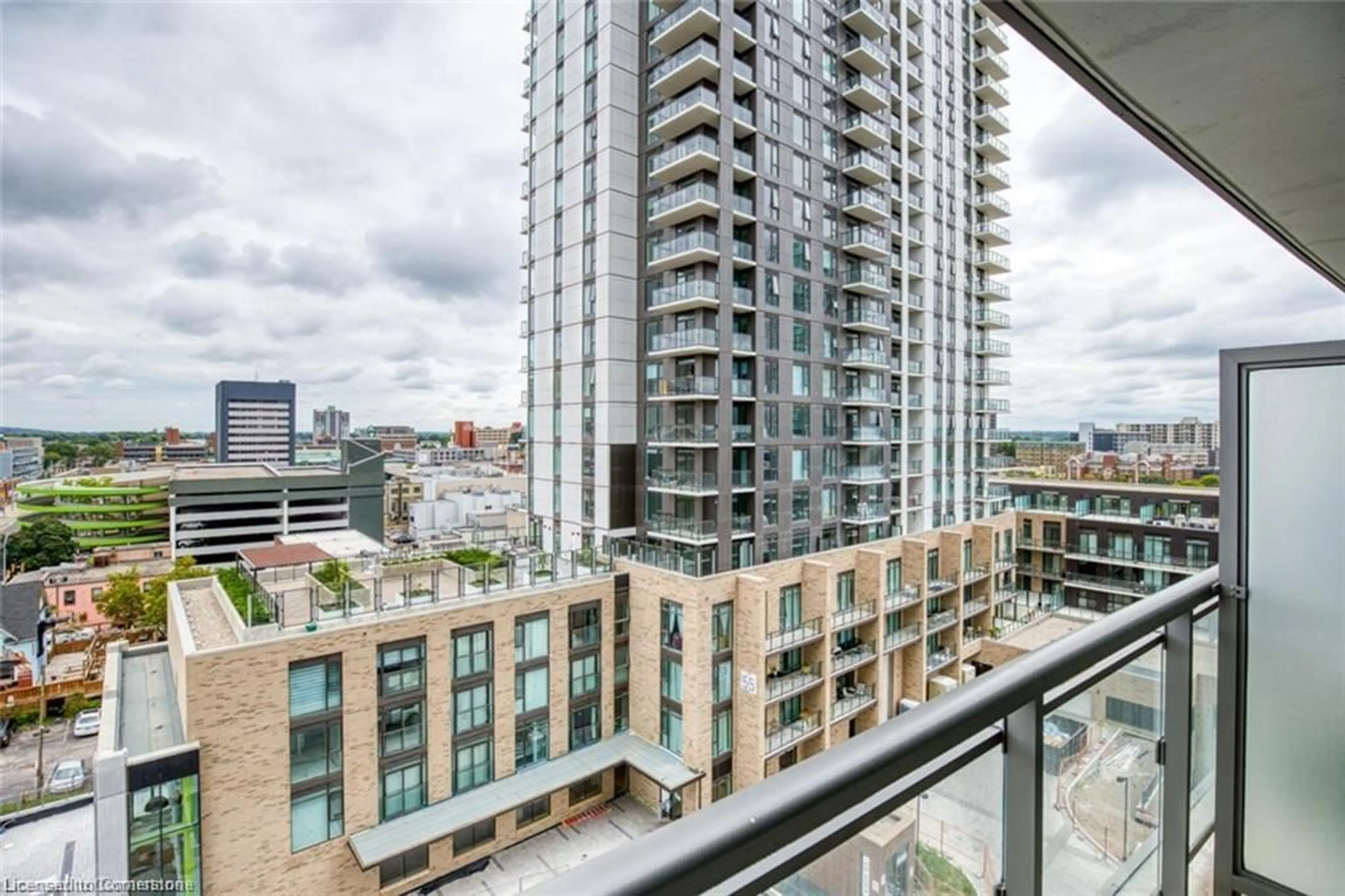 Patio, city buildings view from balcony for 85 Duke St #806, Kitchener Ontario N2H 0B7