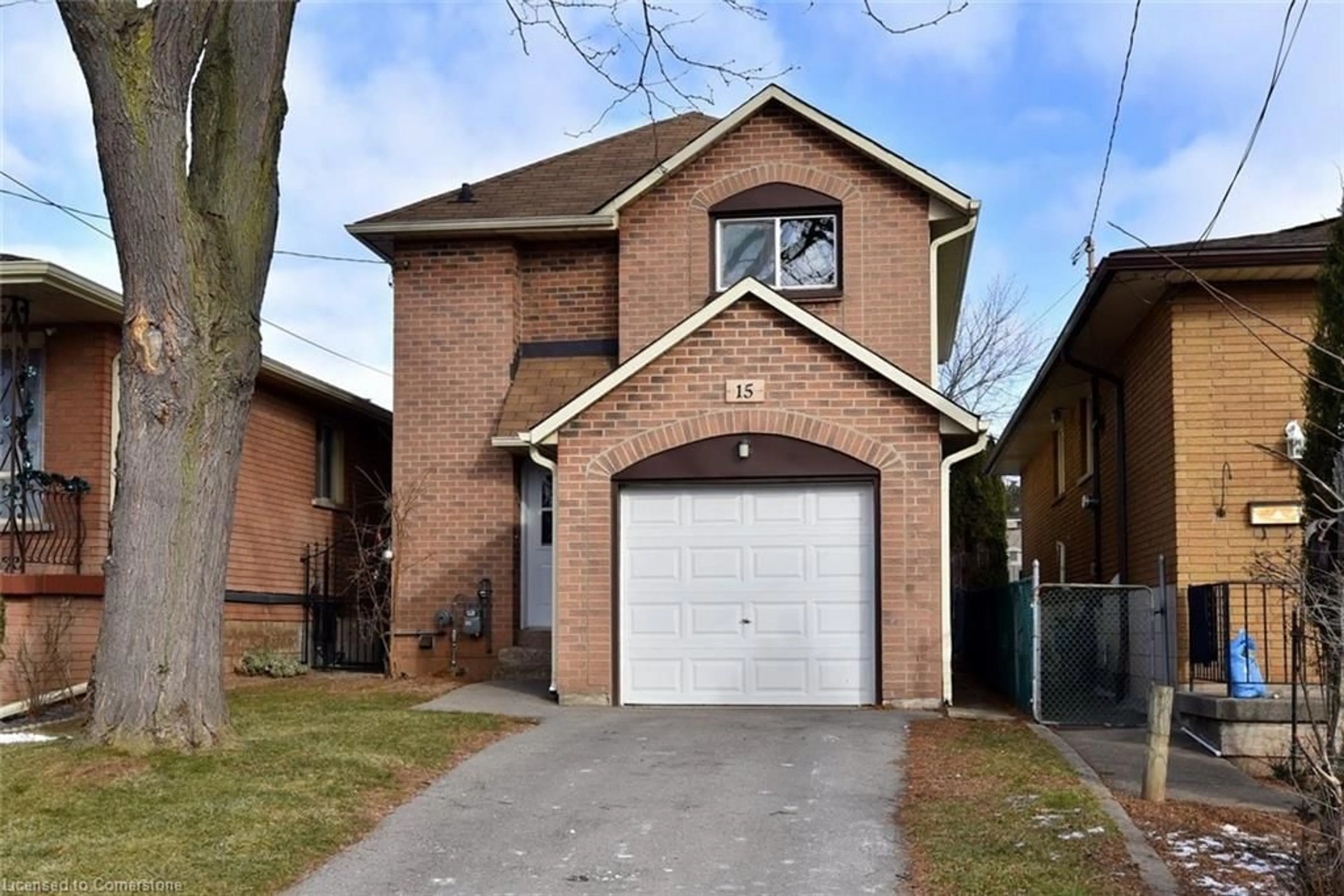 Home with brick exterior material, street for 15 Wood St, Hamilton Ontario L8L 3X9