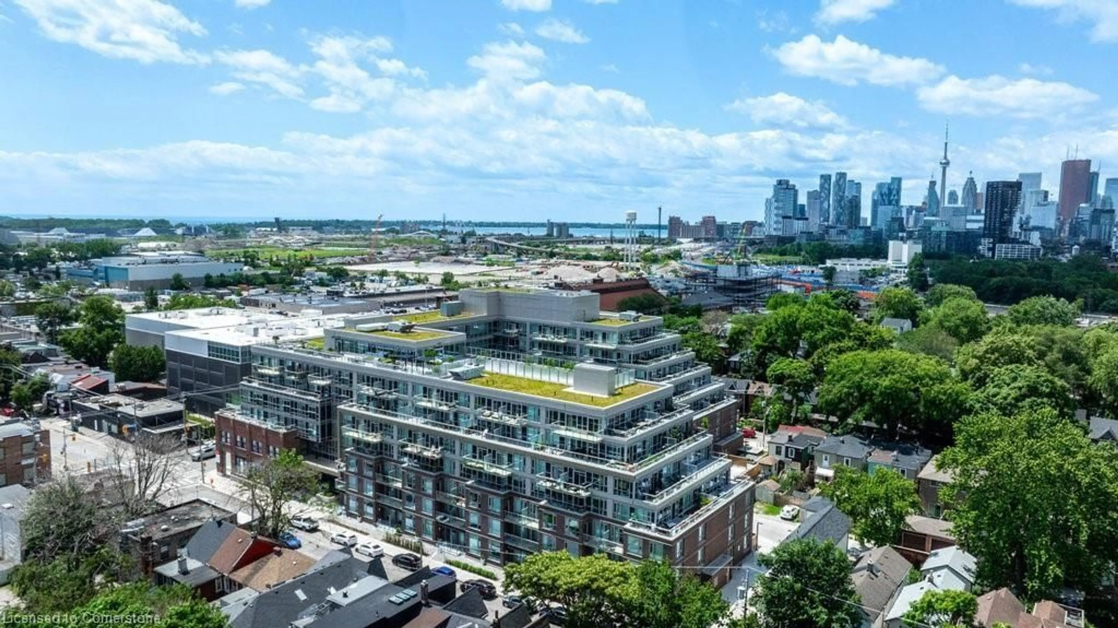 A pic from outside/outdoor area/front of a property/back of a property/a pic from drone, city buildings view from balcony for 150 Logan Ave #115, Toronto Ontario M4M 0E4