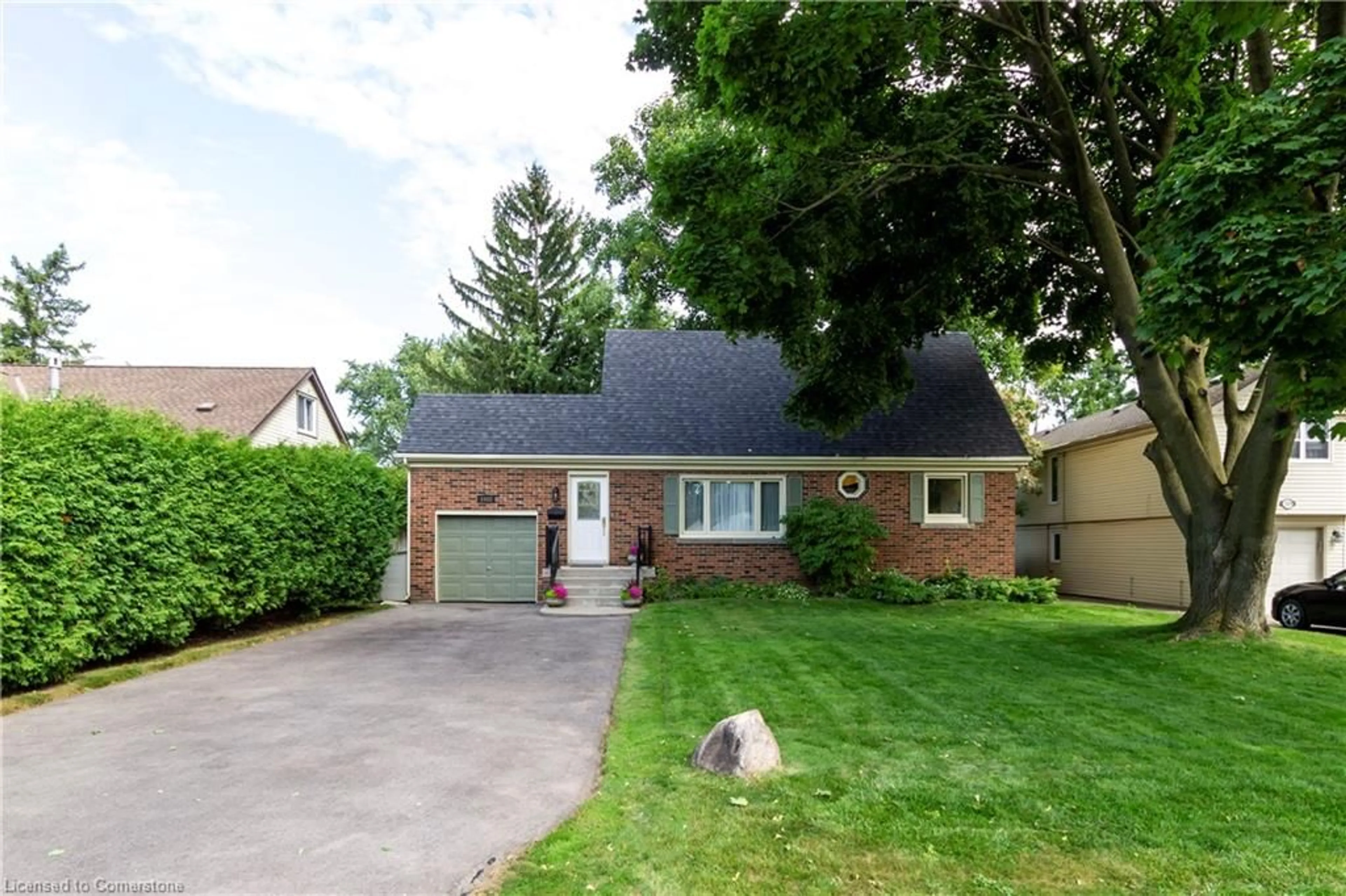 Home with brick exterior material, street for 1043 Joan Dr, Burlington Ontario L7T 3H1