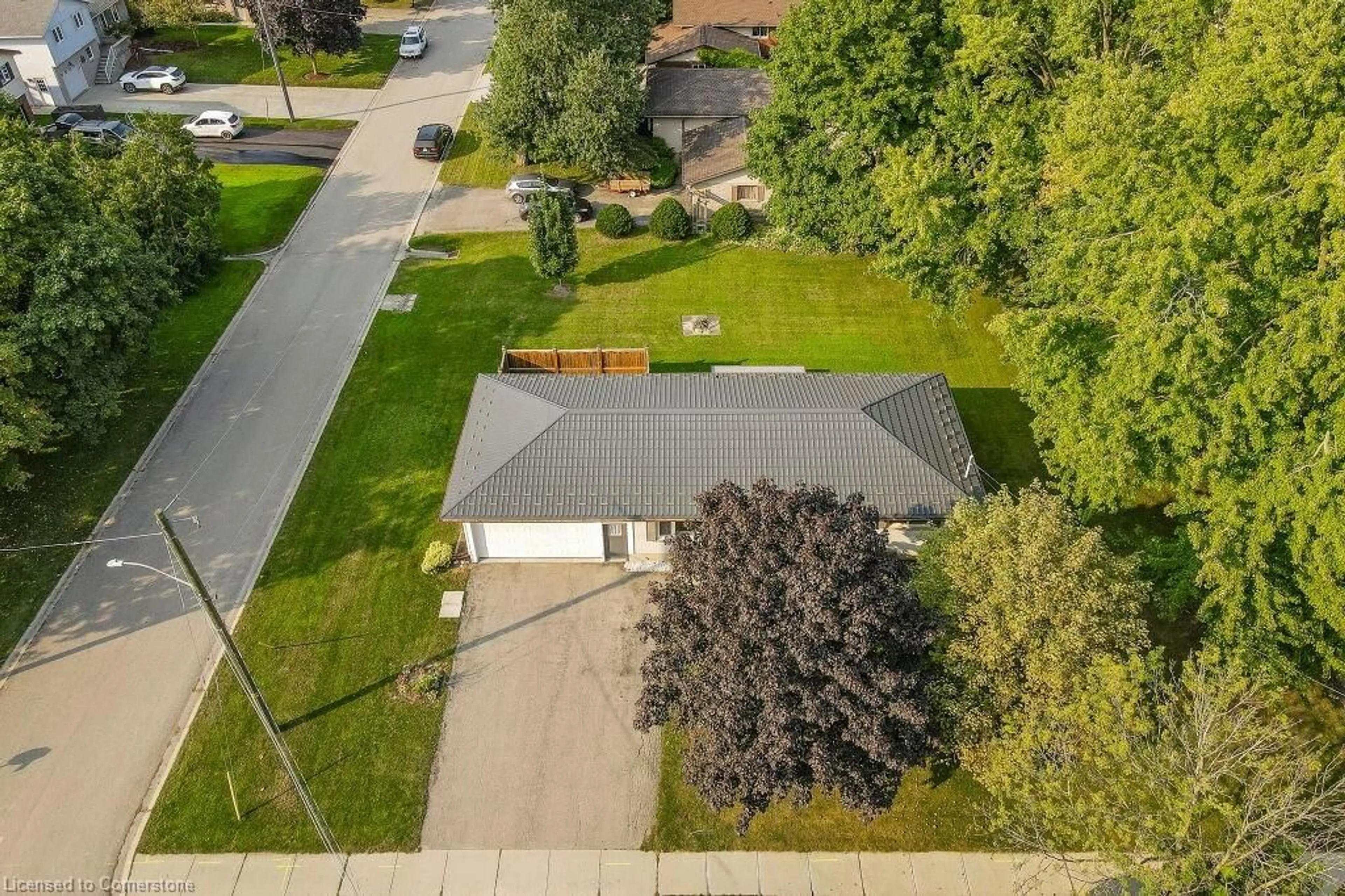 A pic from outside/outdoor area/front of a property/back of a property/a pic from drone, street for 1031 Queens Bush Rd, Wellesley Ontario N0B 2T0