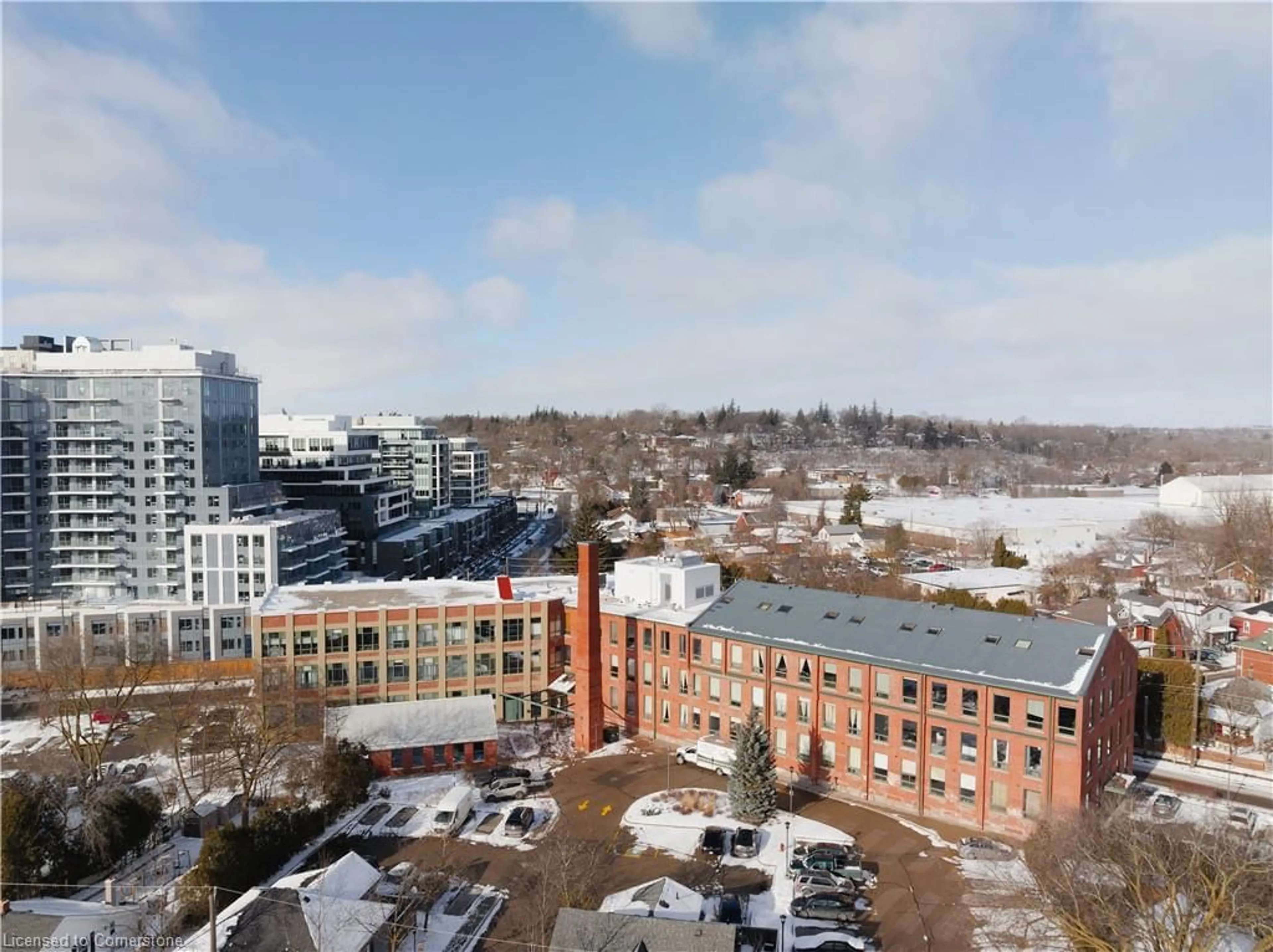 A pic from outside/outdoor area/front of a property/back of a property/a pic from drone, city buildings view from balcony for 26 Ontario St #221, Guelph Ontario N1E 7K1