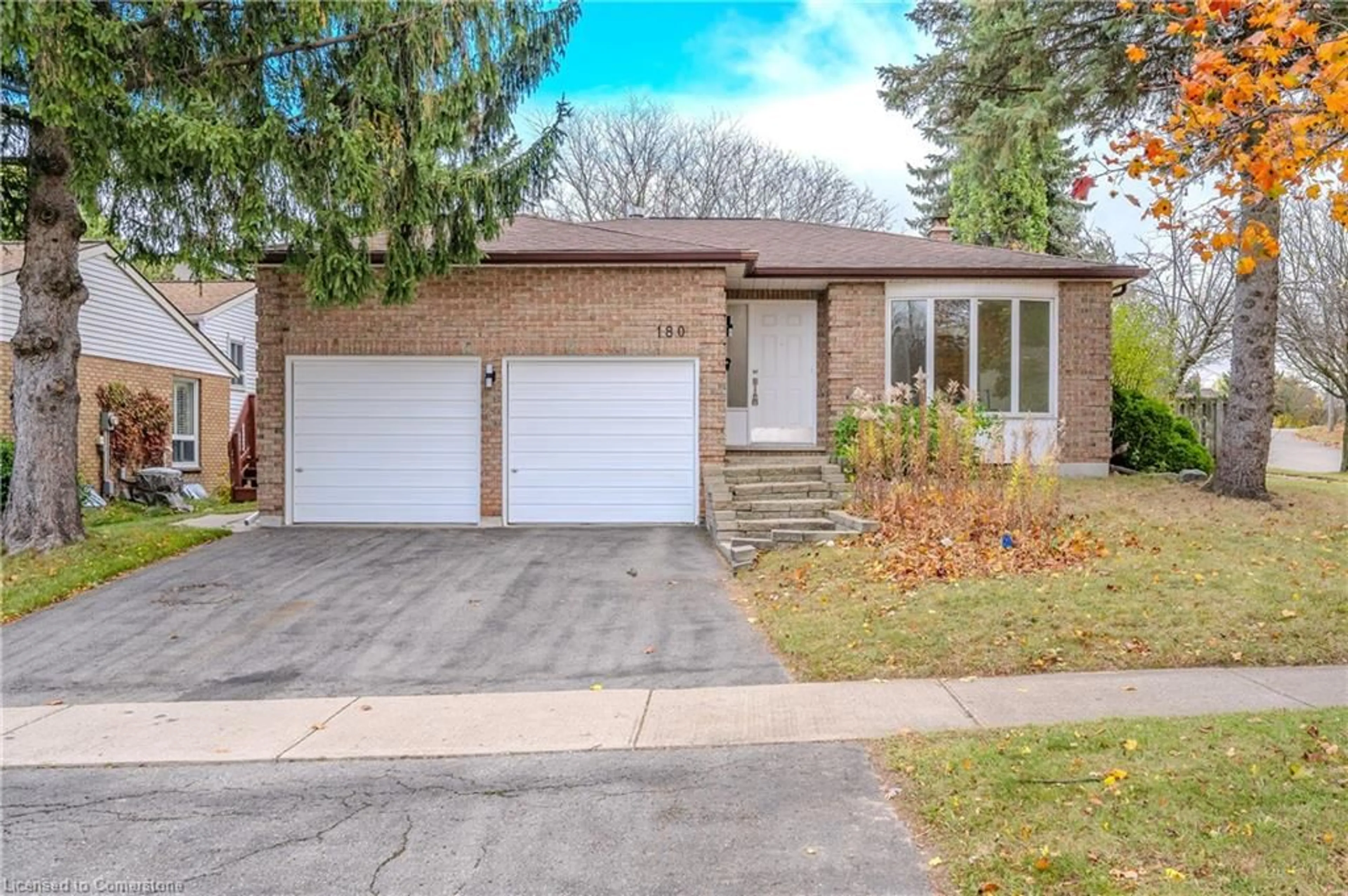 Home with brick exterior material, street for 180 Westvale Dr, Waterloo Ontario N2T 1C2