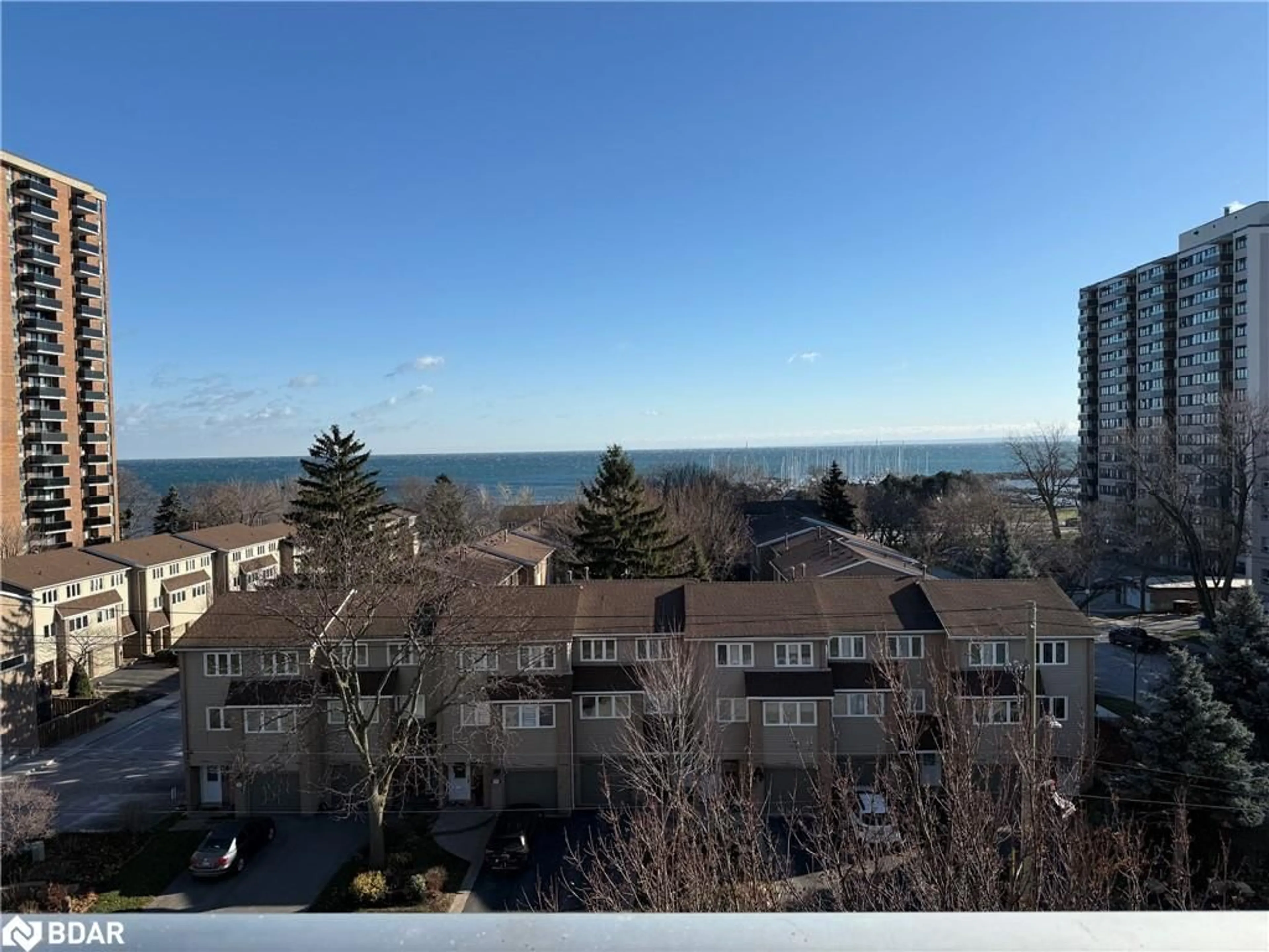 A pic from outside/outdoor area/front of a property/back of a property/a pic from drone, water/lake/river/ocean view for 2263 Marine Dr #607, Oakville Ontario L5L 5K1