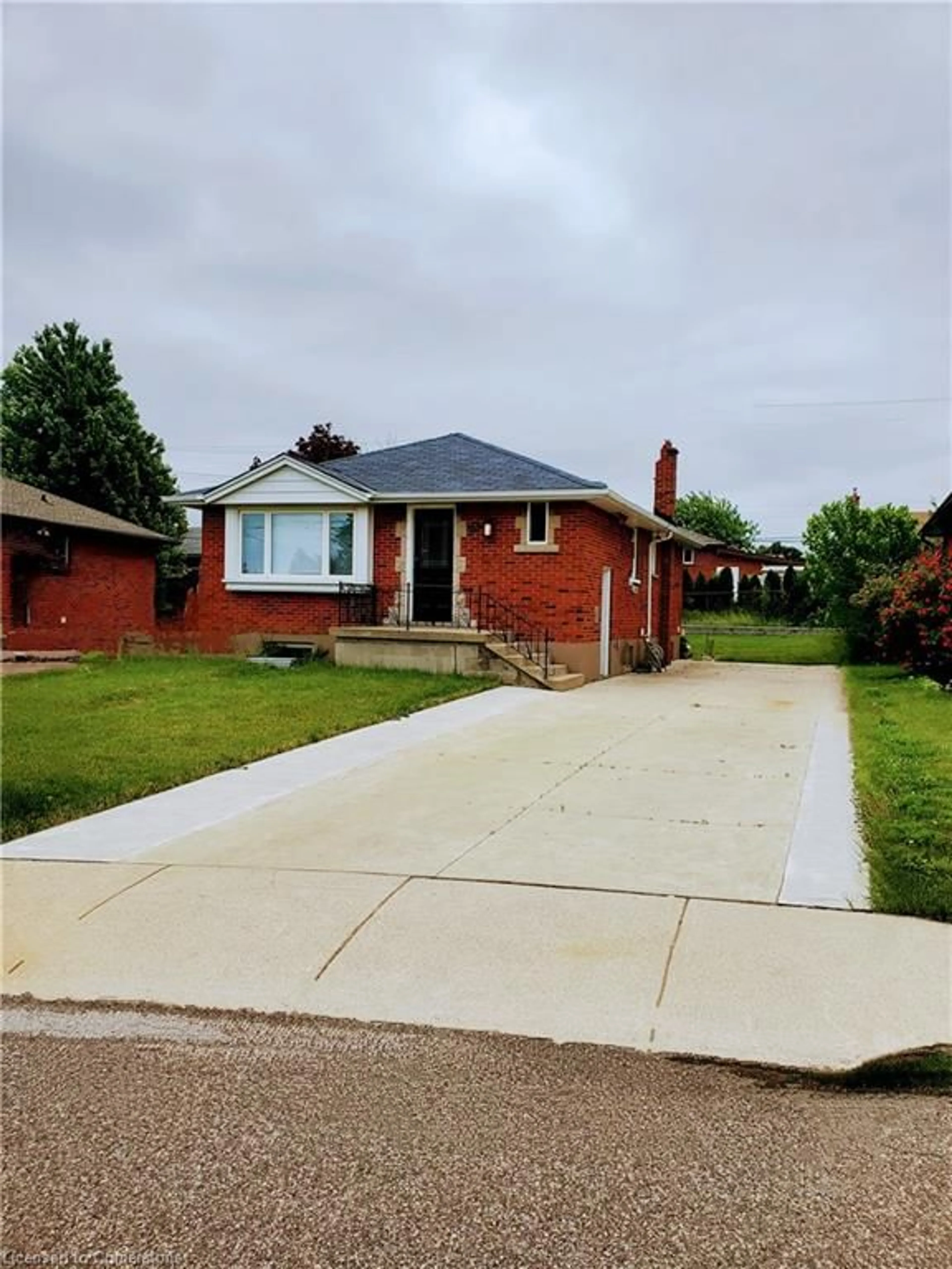 Home with brick exterior material, street for 107 Winchester Blvd, Hamilton Ontario L8T 2M9