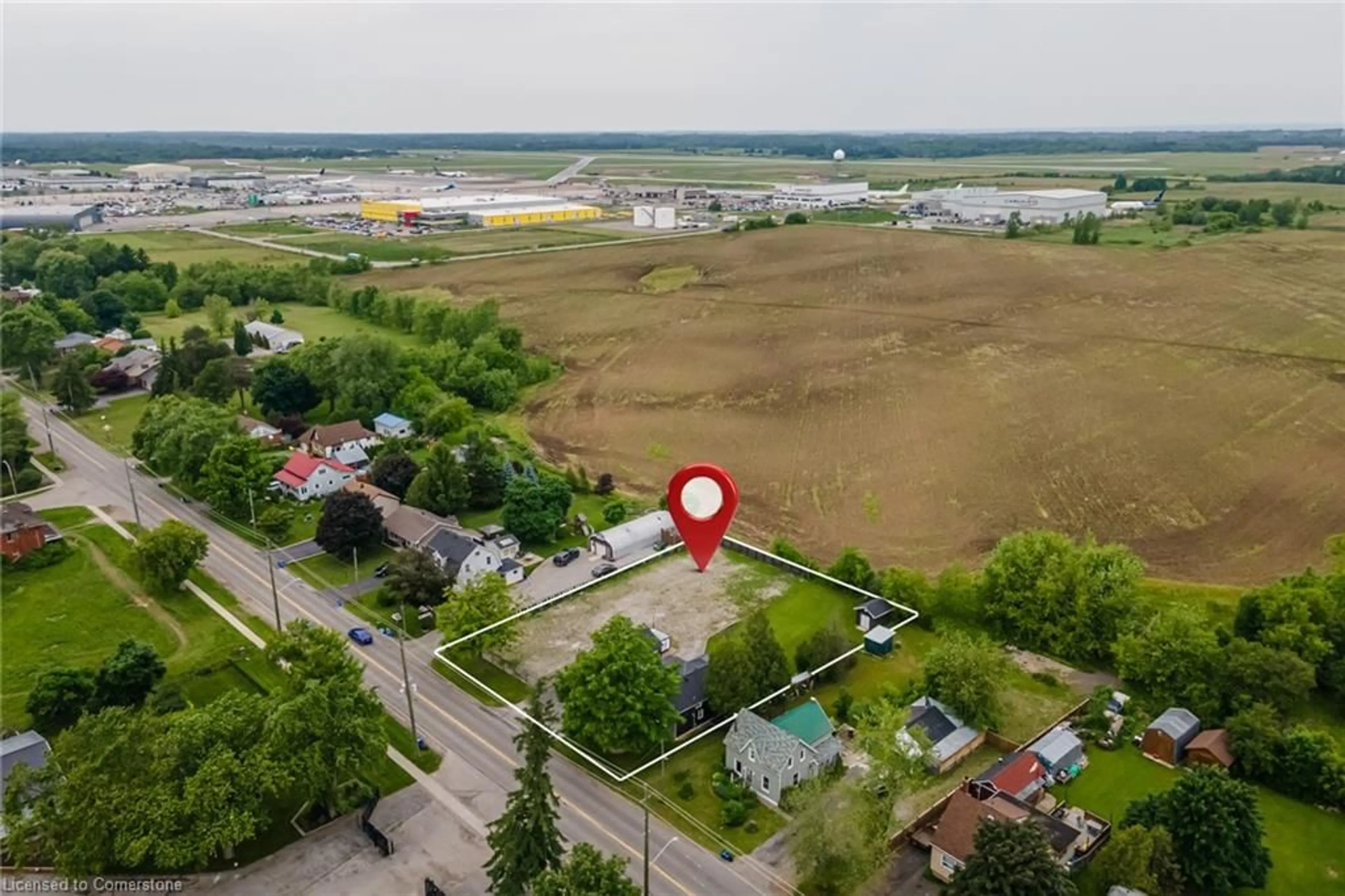 A pic from outside/outdoor area/front of a property/back of a property/a pic from drone, unknown for 9056 Airport Rd, Mount Hope Ontario L0R 1W0