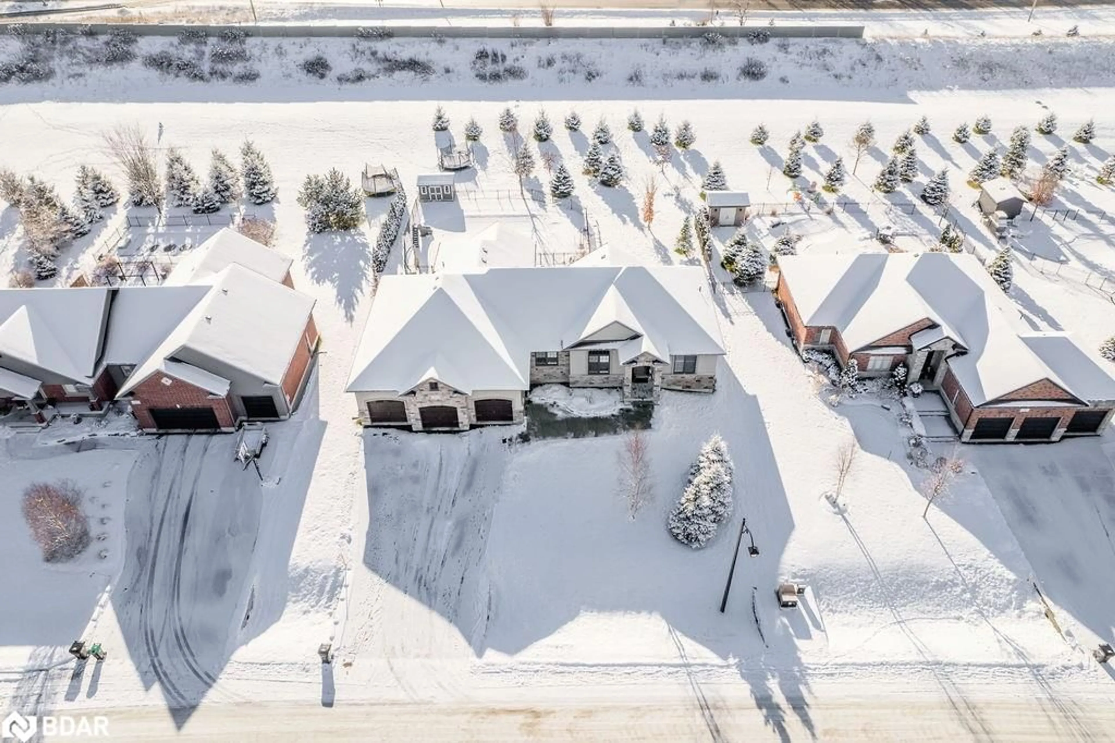 A pic from outside/outdoor area/front of a property/back of a property/a pic from drone, street for 25 Mennill Dr, Snow Valley Ontario L0L 1Y3