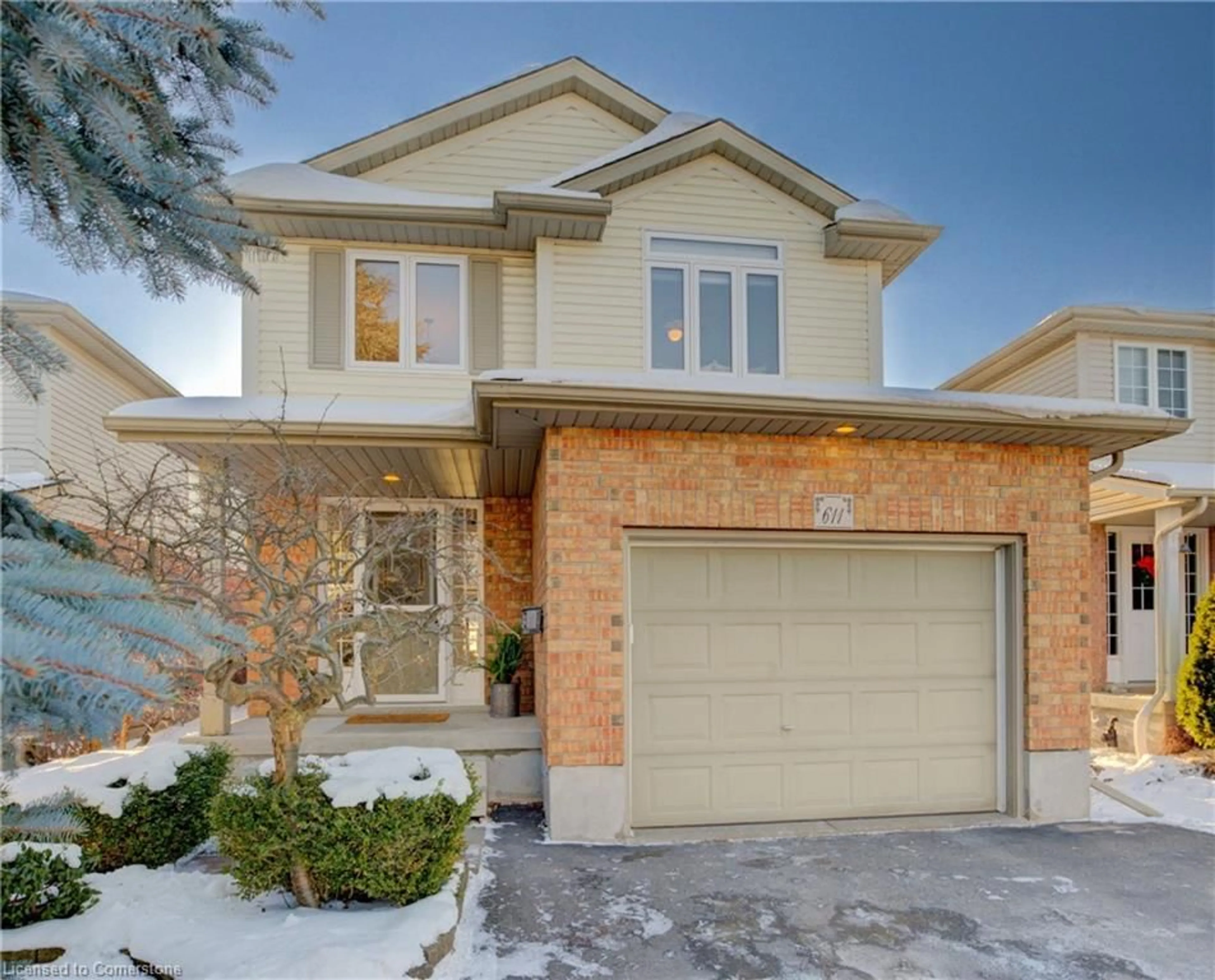 Home with brick exterior material, street for 611 Breakwater Cres, Waterloo Ontario N2K 4H6