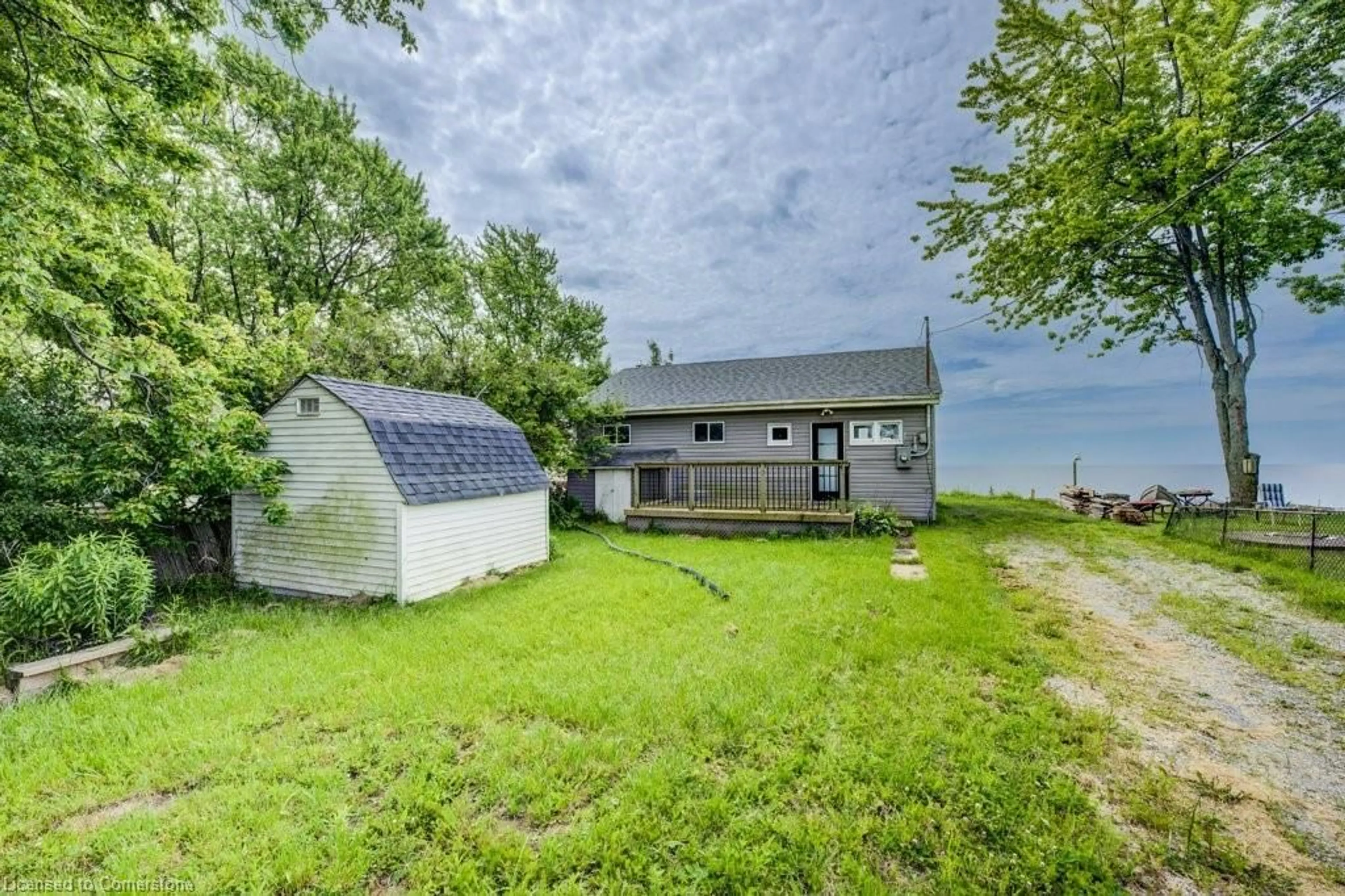 A pic from outside/outdoor area/front of a property/back of a property/a pic from drone, water/lake/river/ocean view for 41 Derner Line, Dunnville Ontario N0A 1K0