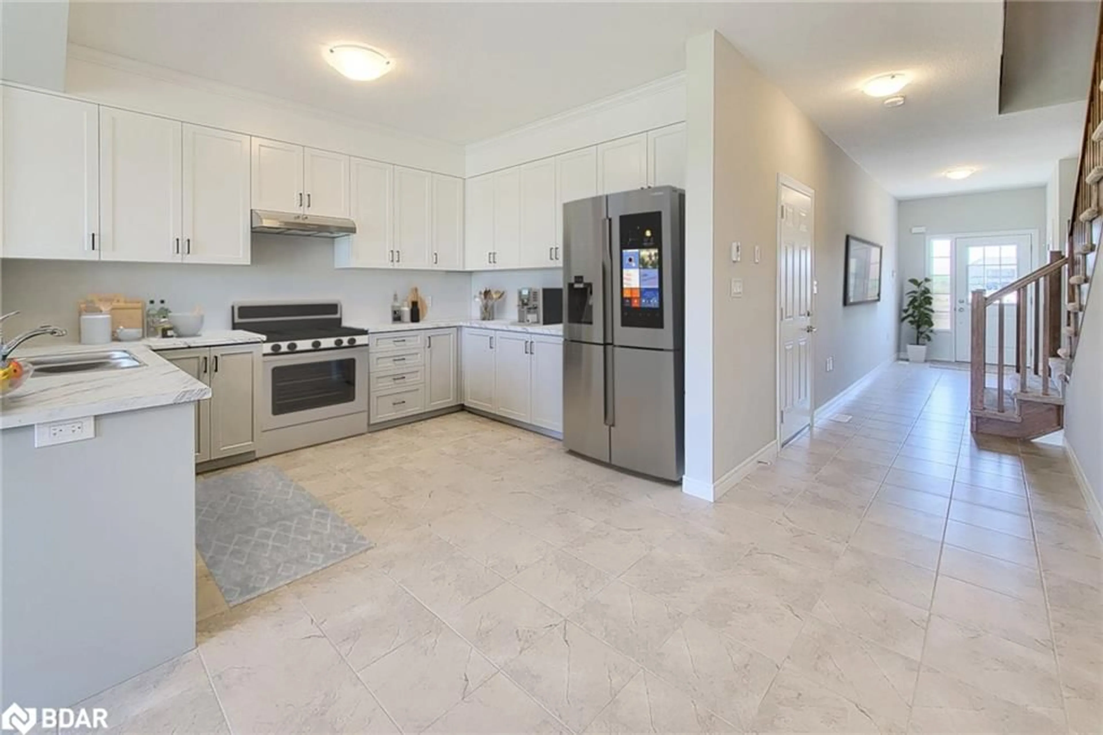 Open concept kitchen, ceramic/tile floor for 59 Lloyd Davies Way, Binbrook Ontario L0R 1C0