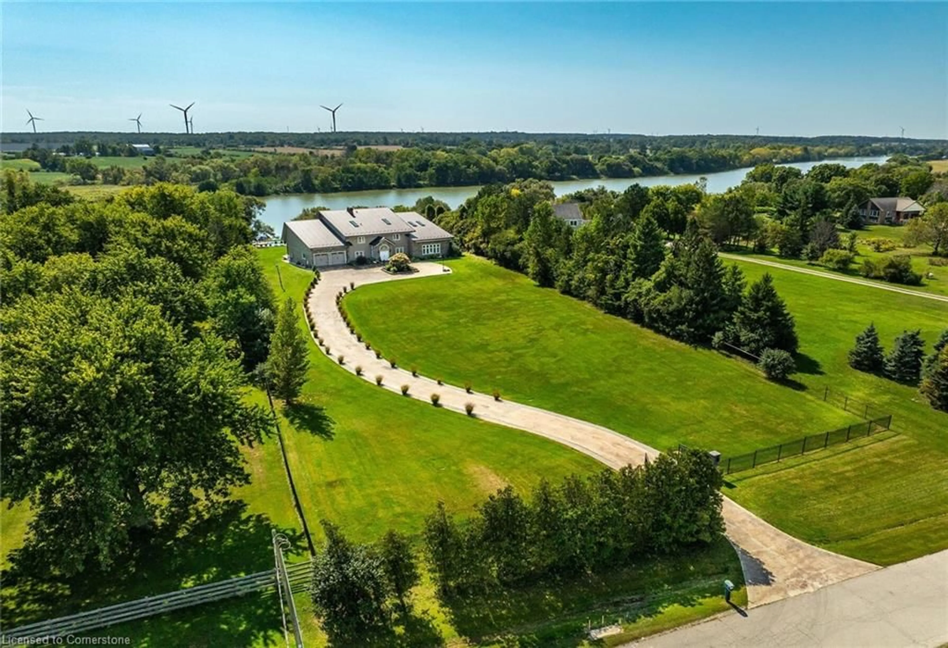 A pic from outside/outdoor area/front of a property/back of a property/a pic from drone, water/lake/river/ocean view for 21 Riverside Dr, Cayuga Ontario N0A 1E0