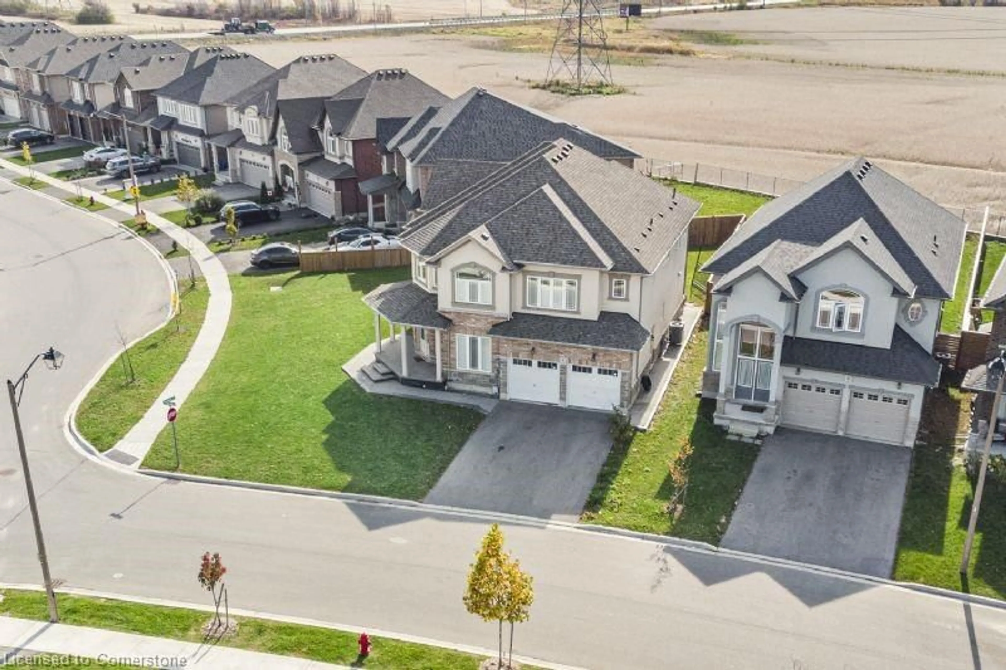 A pic from outside/outdoor area/front of a property/back of a property/a pic from drone, street for 4 Dolomiti Court, Hamilton Ontario L0R 1P0