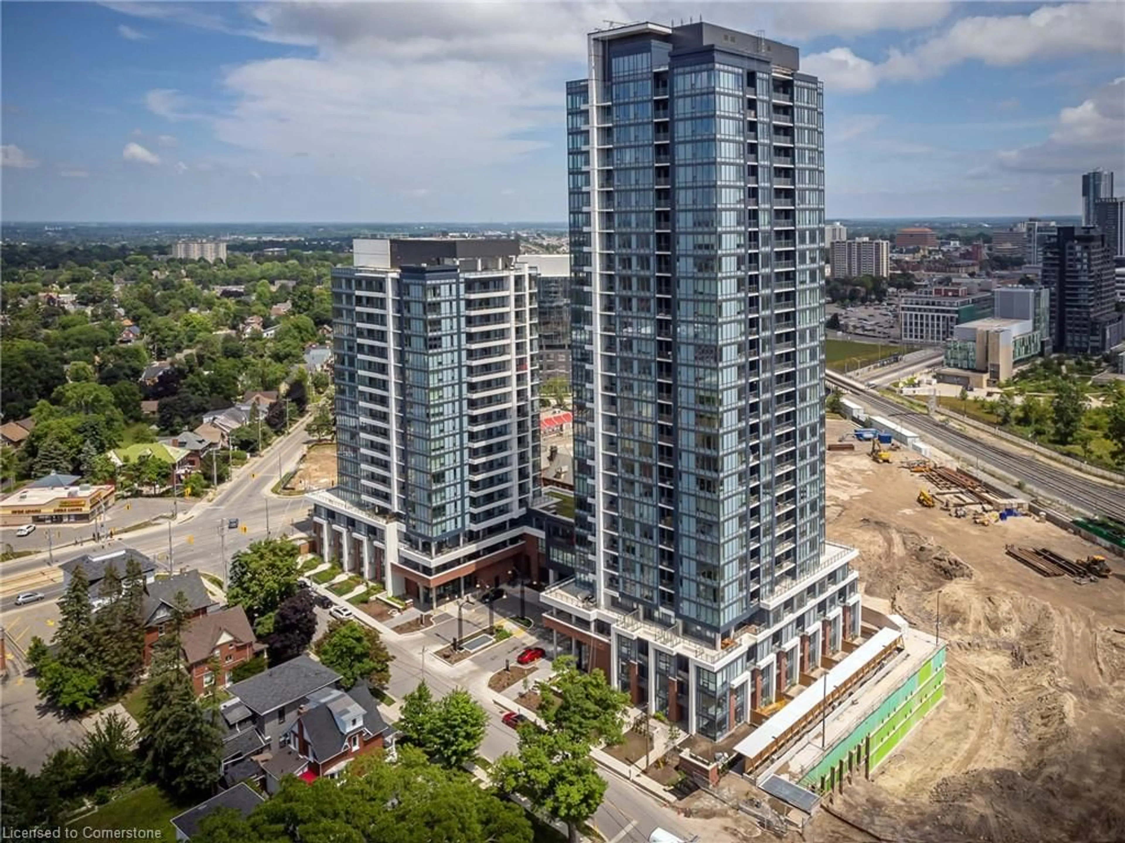 A pic from outside/outdoor area/front of a property/back of a property/a pic from drone, city buildings view from balcony for 15 Wellington St #612, Kitchener Ontario N2G 0E4