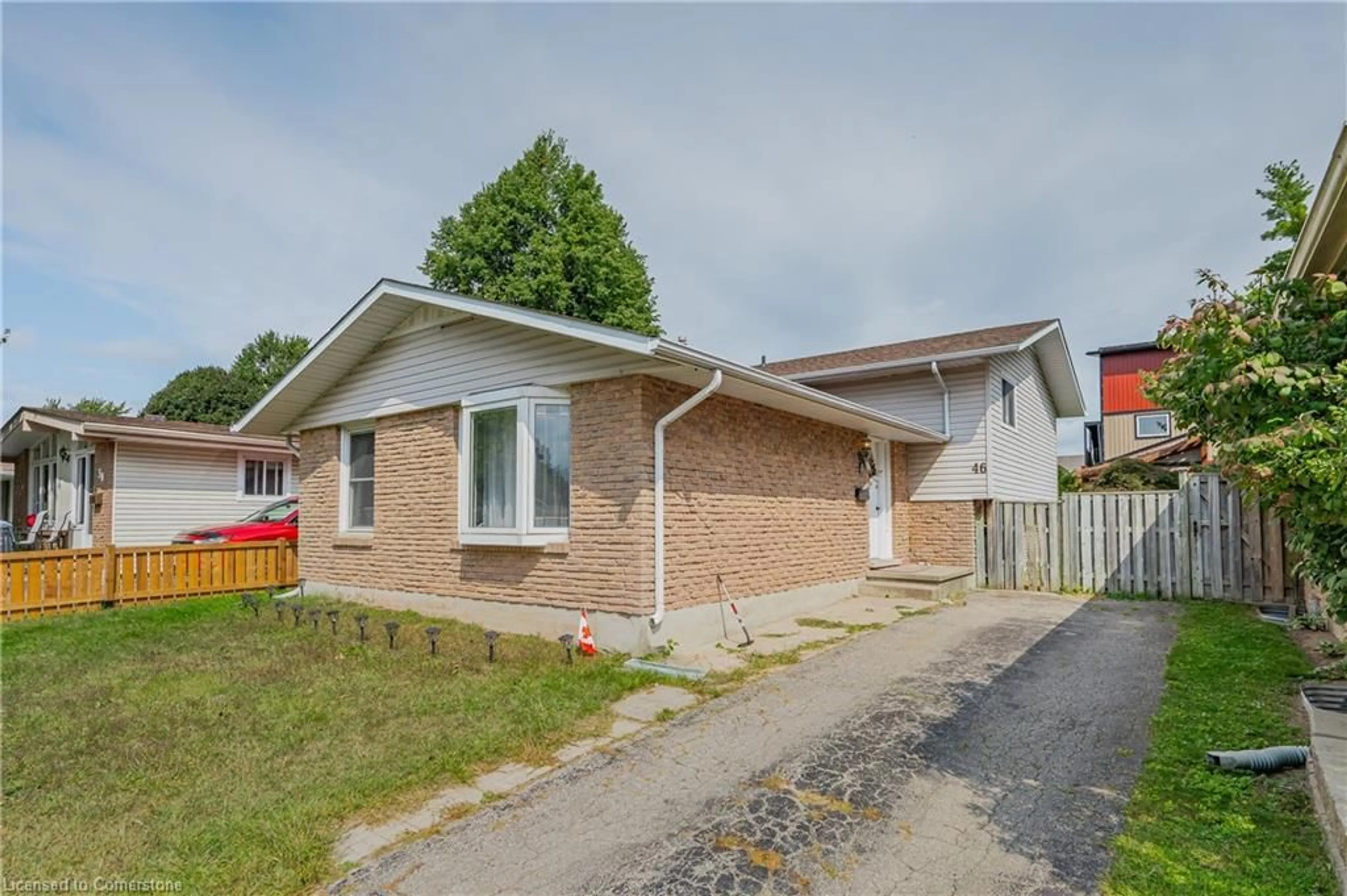 Home with brick exterior material, street for 46 Calmcrest Dr, Kitchener Ontario N2E 1V3