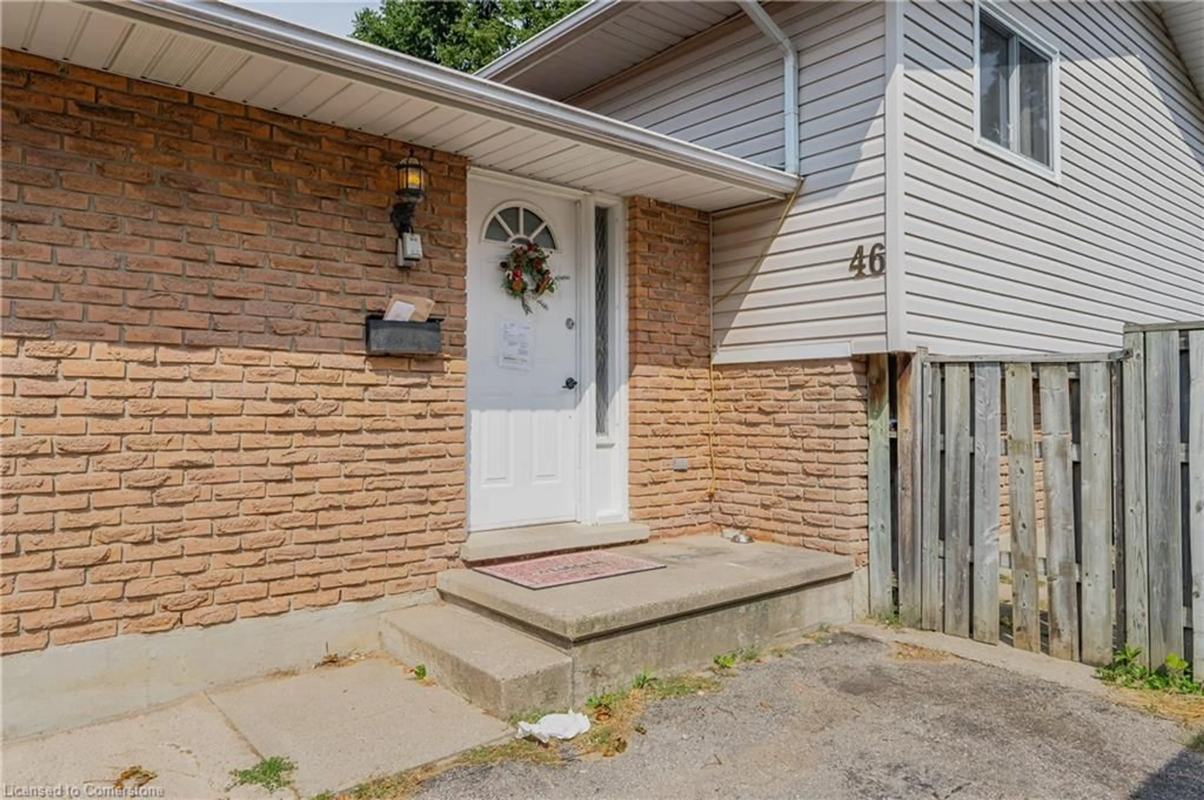 Home with brick exterior material, street for 46 Calmcrest Dr, Kitchener Ontario N2E 1V3