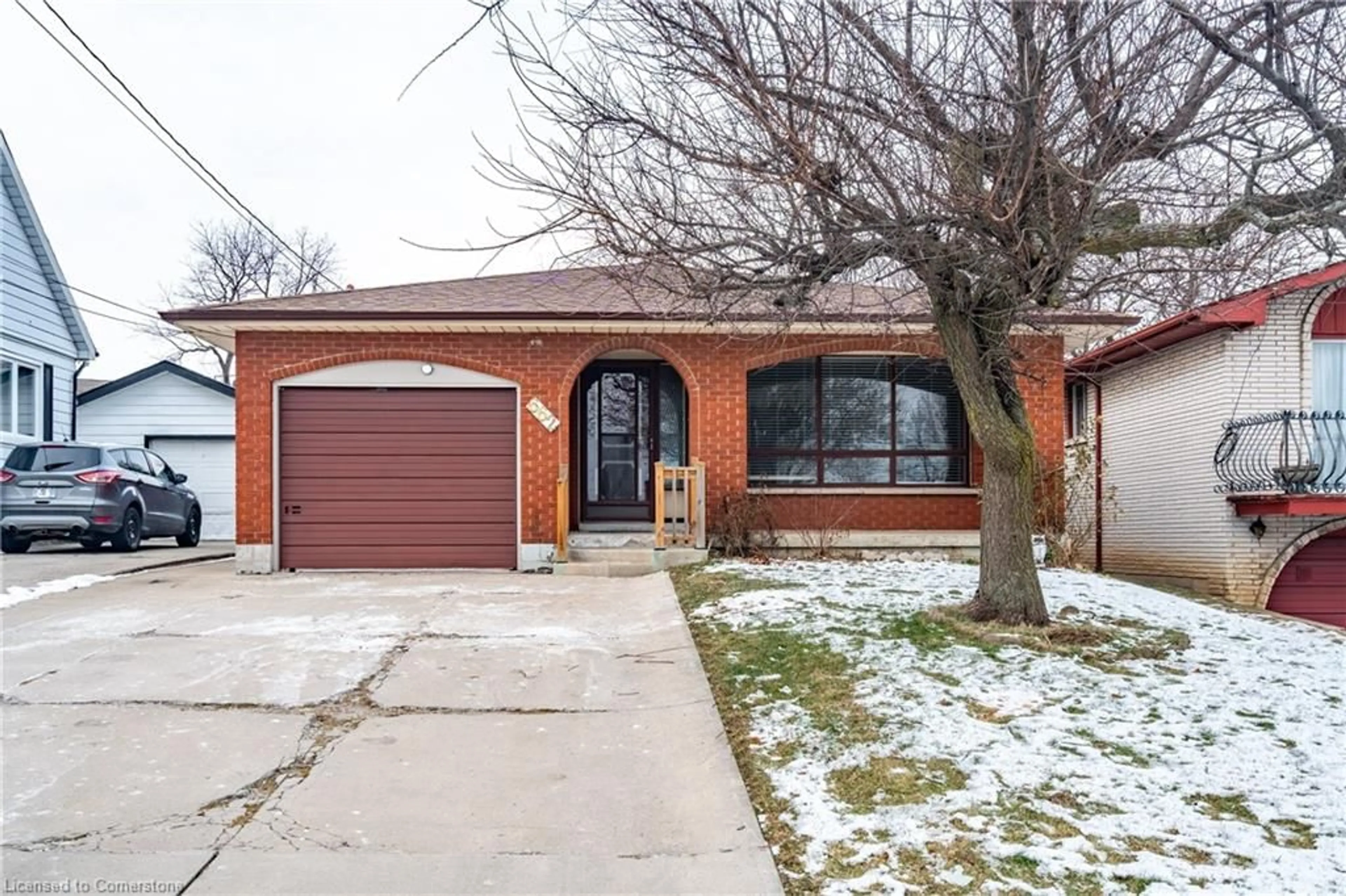 Home with brick exterior material, street for 662 West 5th St, Hamilton Ontario L9C 3R2