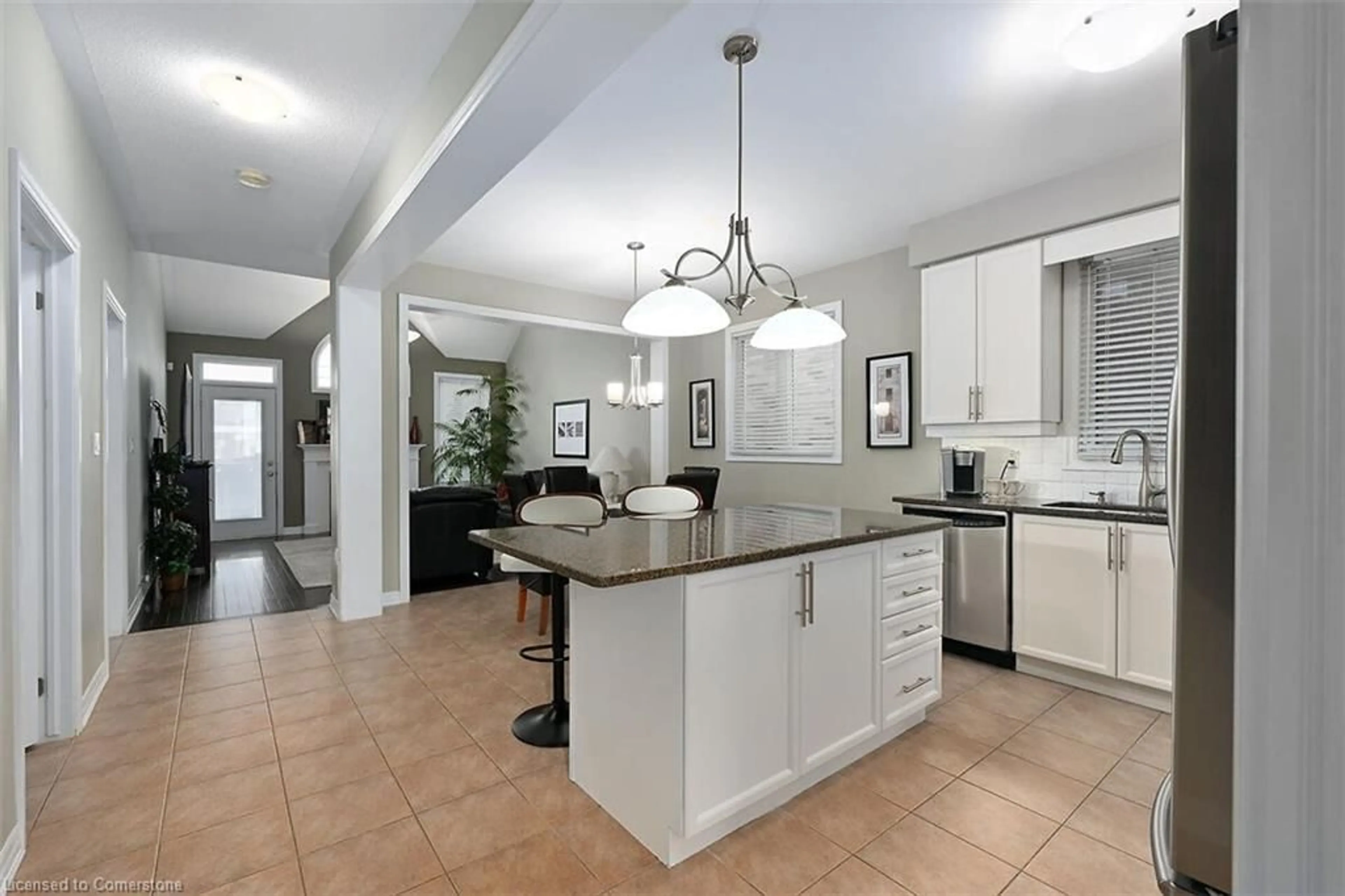 Open concept kitchen, ceramic/tile floor for 701 Savoline Blvd, Milton Ontario L9T 0N2