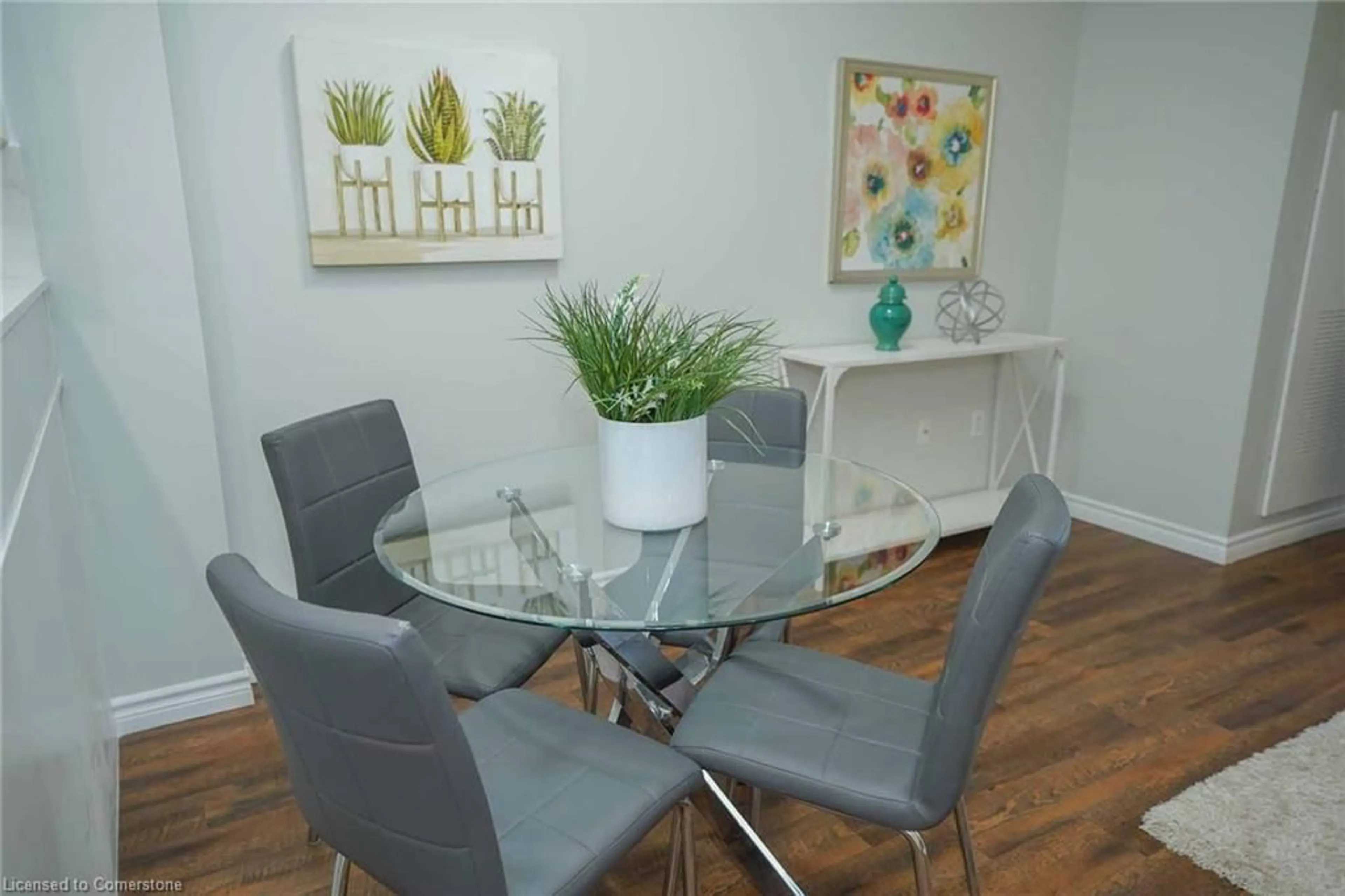 Dining room, wood/laminate floor for 7 Kay Cres #107, Guelph Ontario N1L 0L9