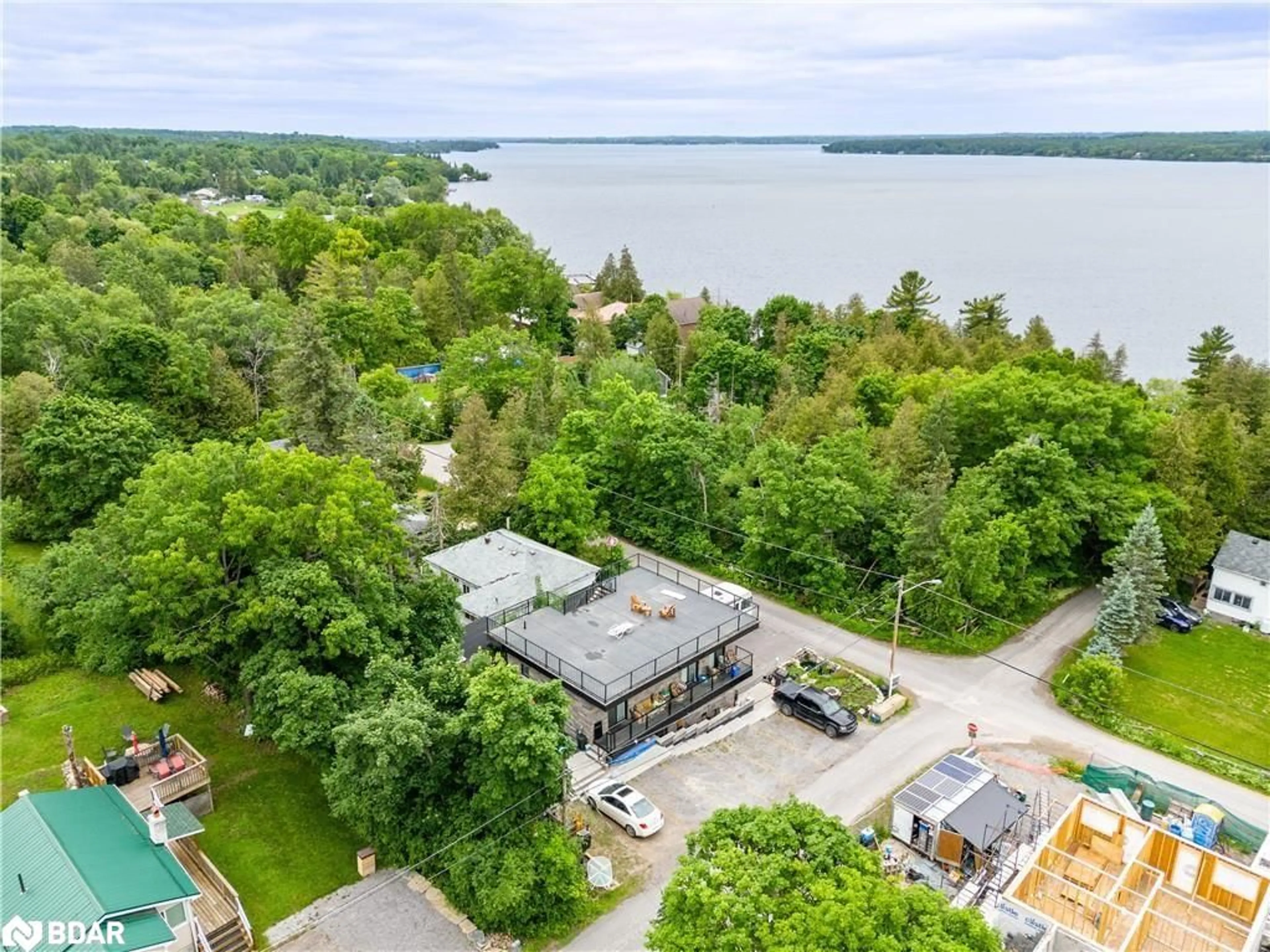 A pic from outside/outdoor area/front of a property/back of a property/a pic from drone, water/lake/river/ocean view for 31 Silver Birch St, Dunsford Ontario K0M 1L0