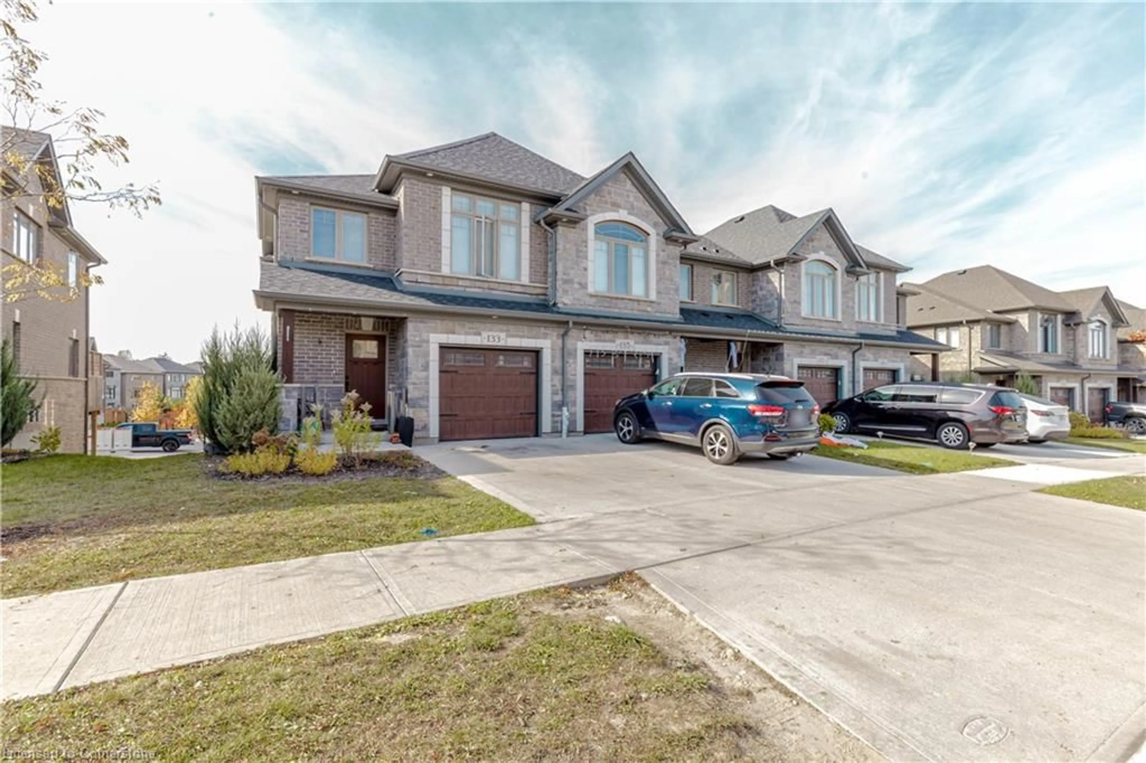 Home with brick exterior material, street for 133 Hollybrook Trail, Kitchener Ontario N2R 0P1