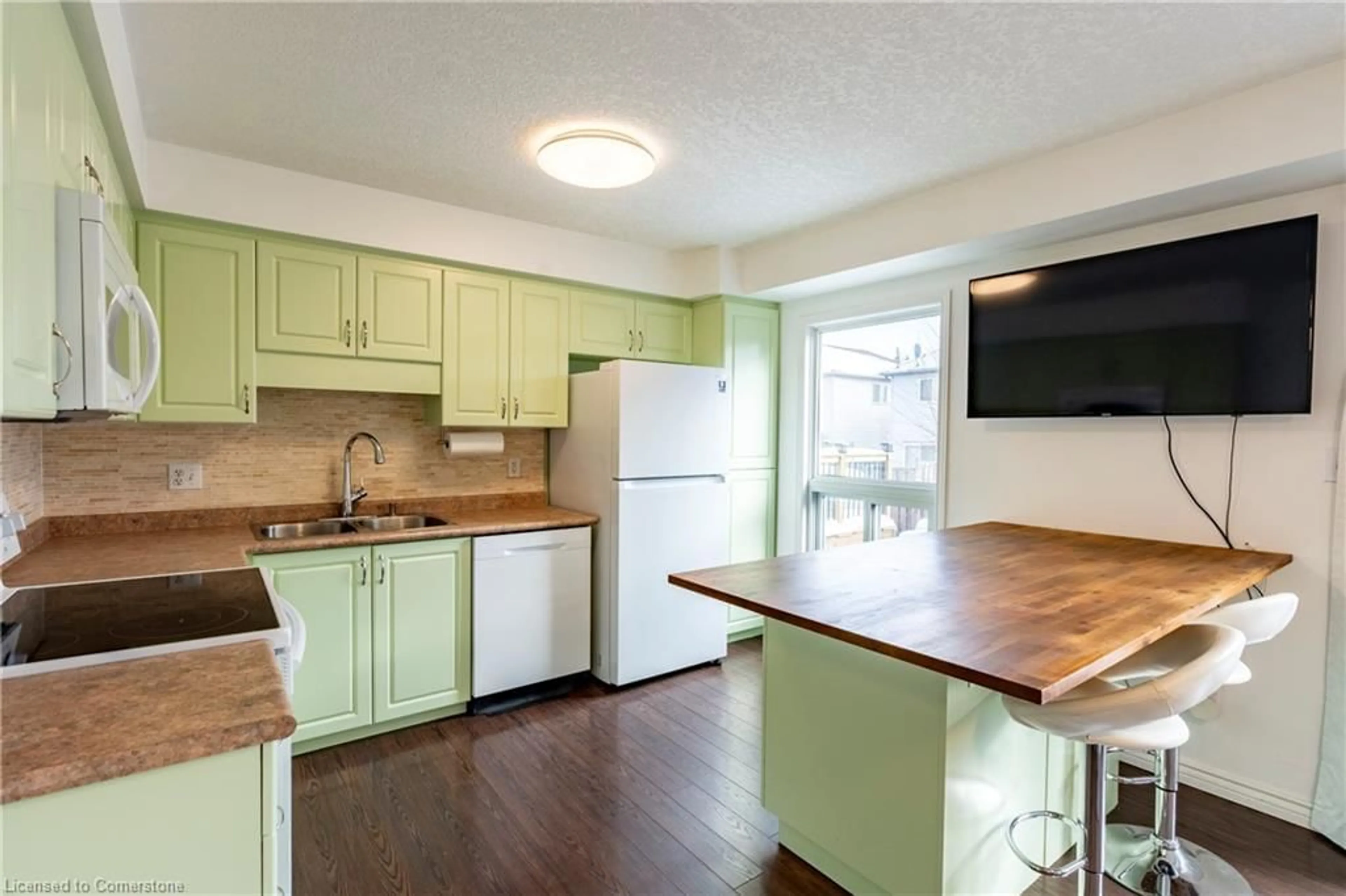 Open concept kitchen, wood/laminate floor for 216 Sophia Cres, Kitchener Ontario N2R 1X8