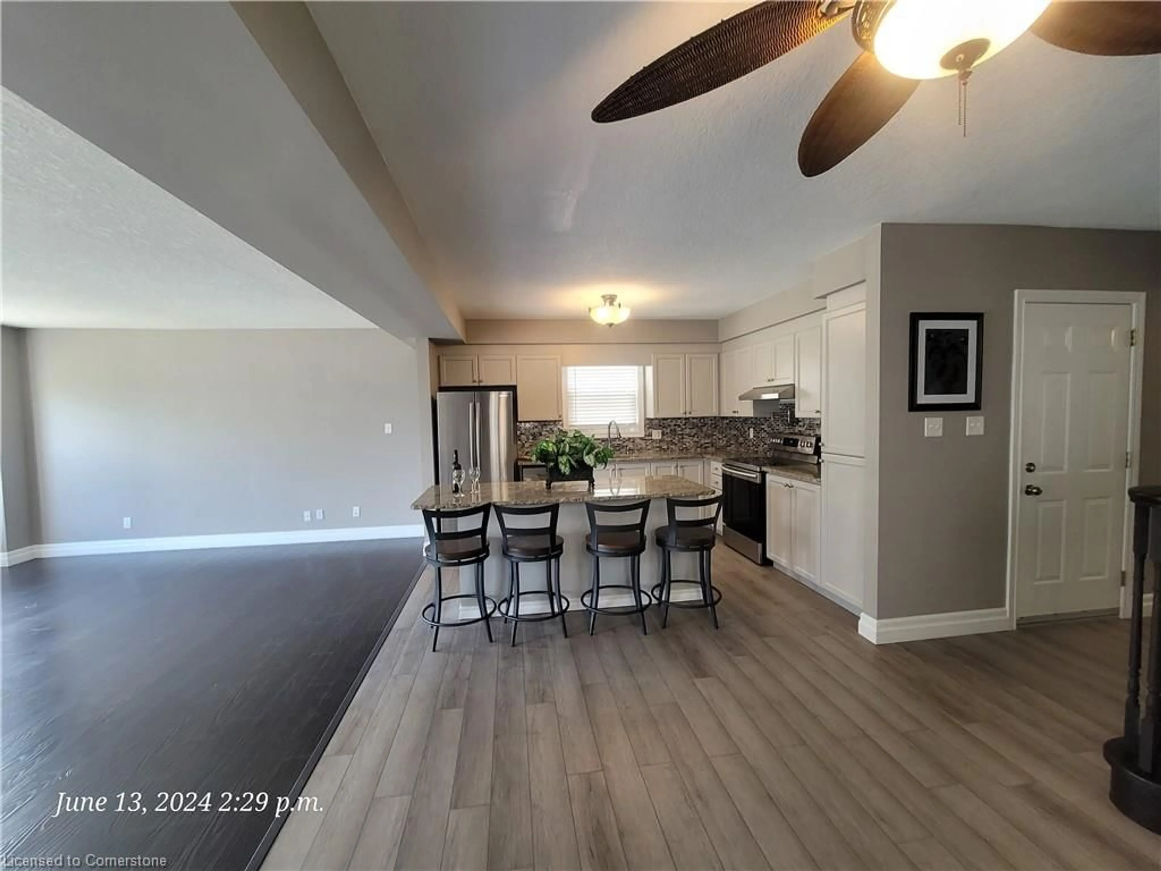 Open concept kitchen, wood/laminate floor for 91 Red Clover Cres, Kitchener Ontario N2E 4G7