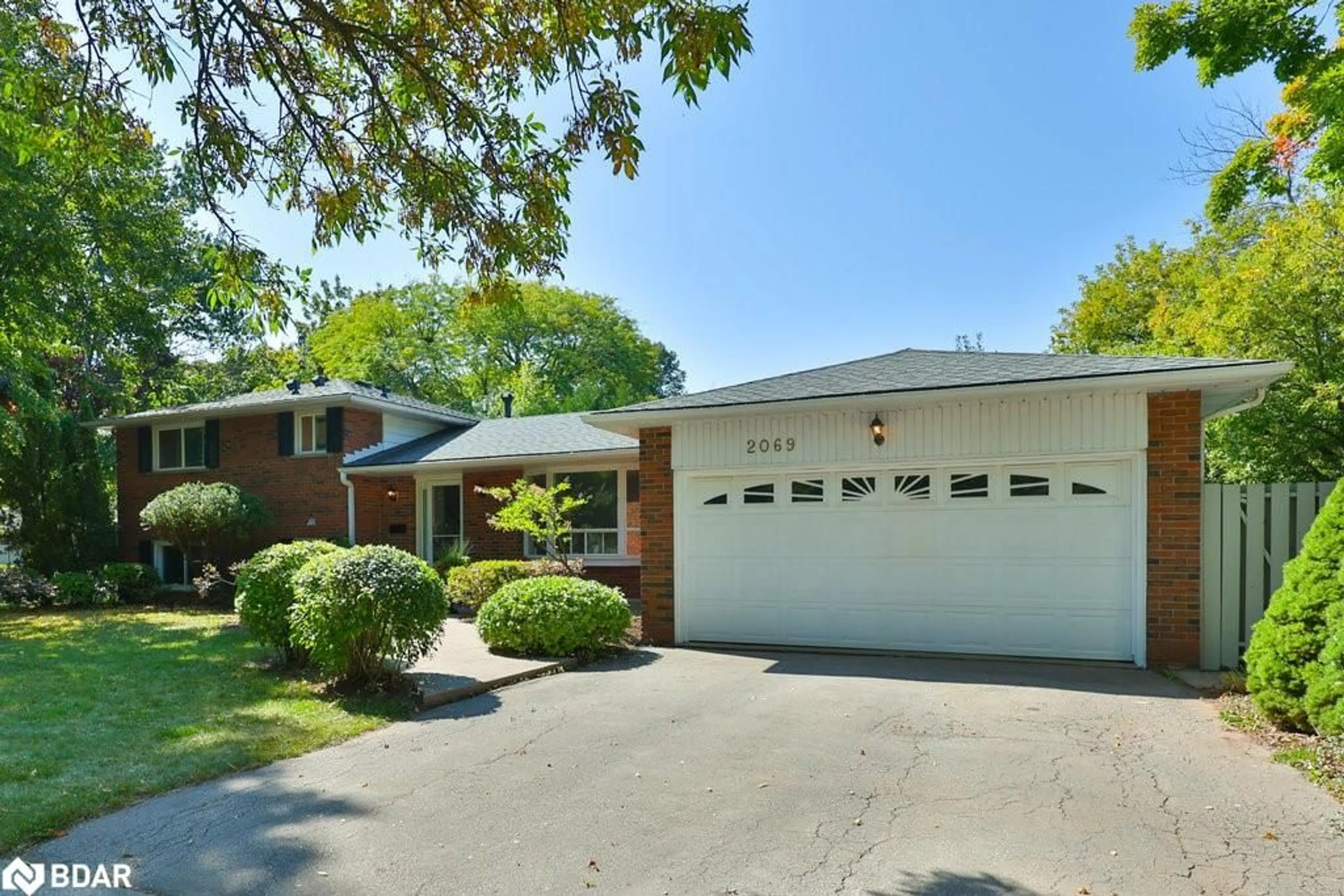 Home with brick exterior material, street for 2069 Thornlea Dr, Oakville Ontario L6L 1K4