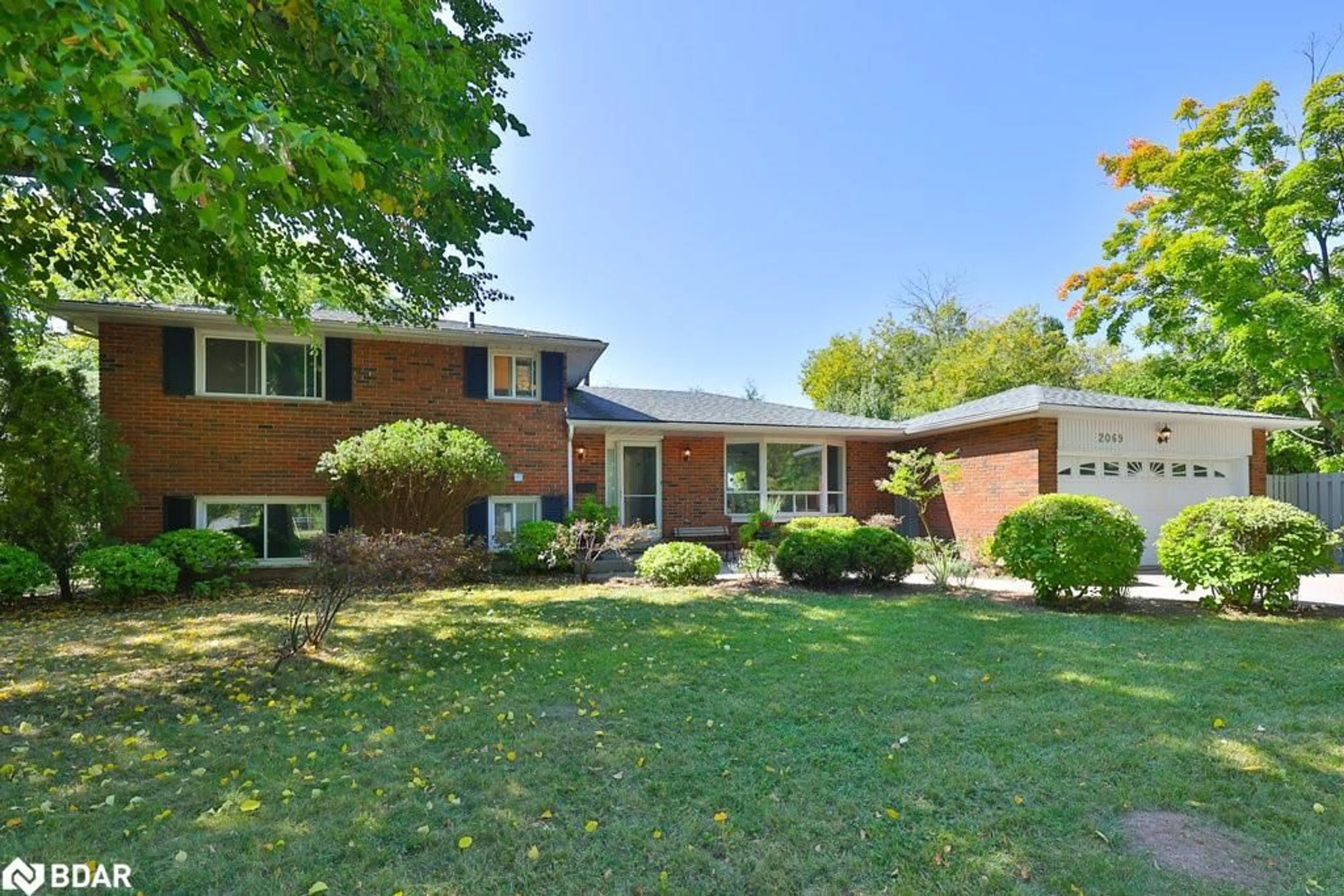 Home with brick exterior material, street for 2069 Thornlea Dr, Oakville Ontario L6L 1K4