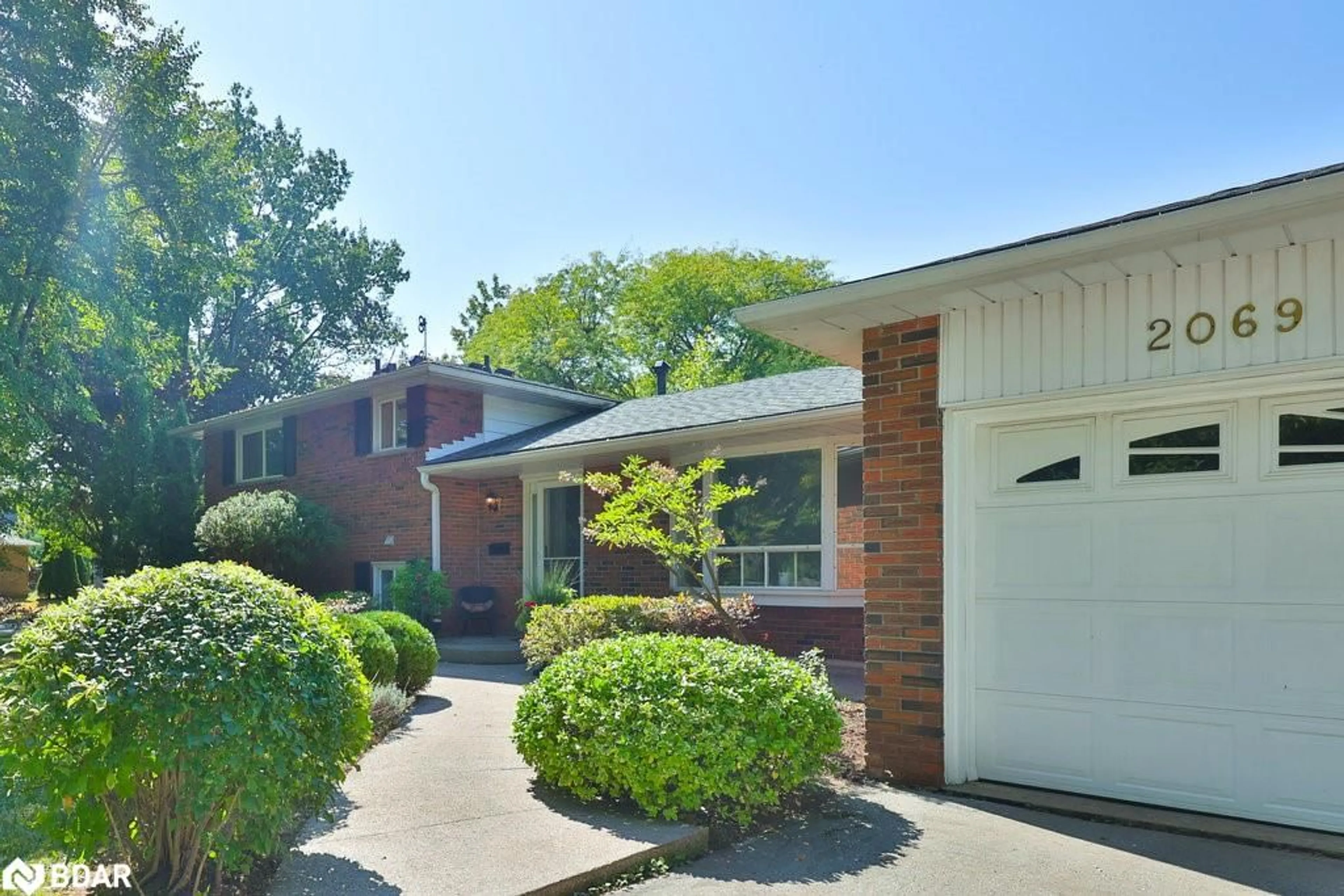 Home with brick exterior material, street for 2069 Thornlea Dr, Oakville Ontario L6L 1K4