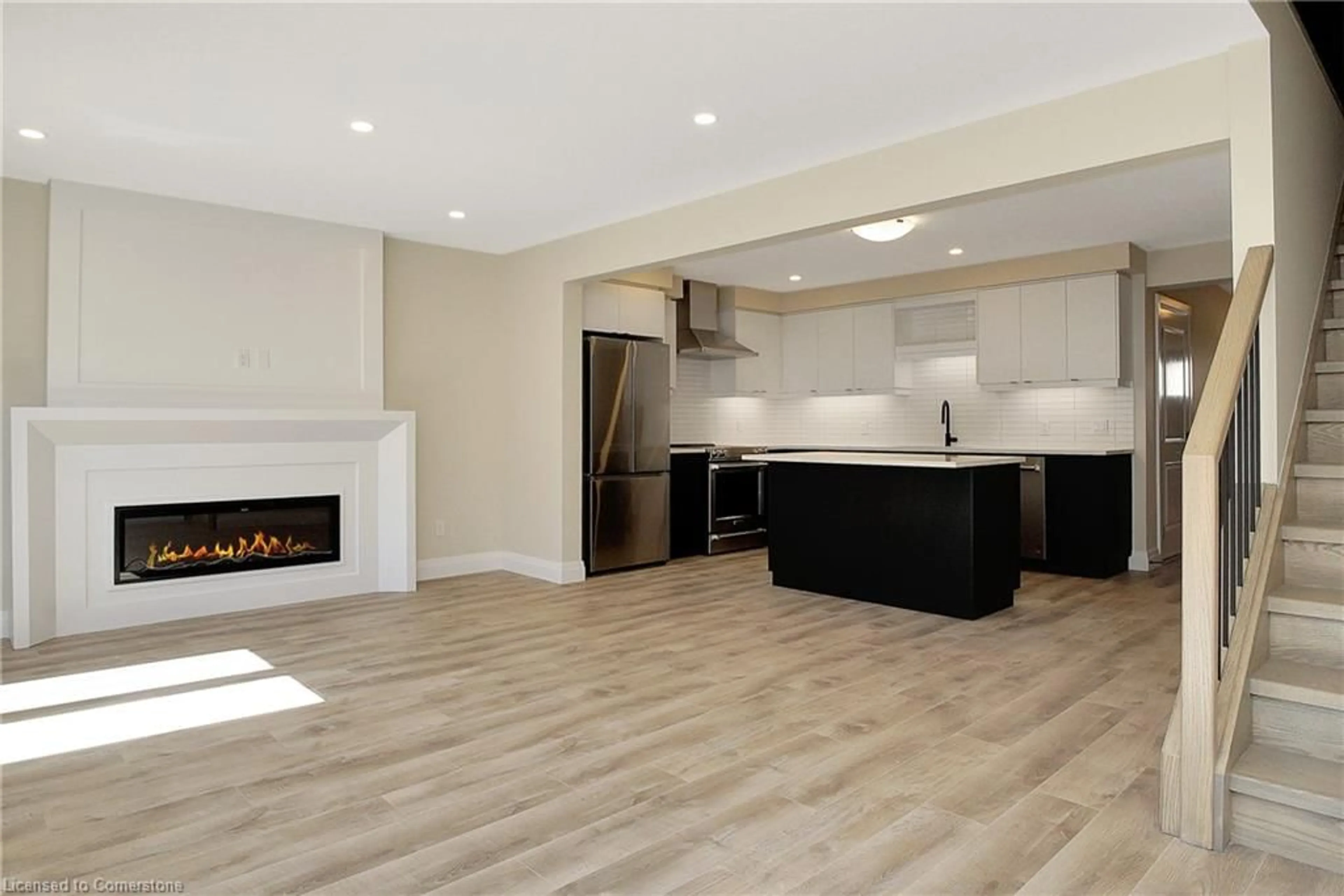 Open concept kitchen, wood/laminate floor for 40 Bastien St #10, Cambridge Ontario N1R 5S2