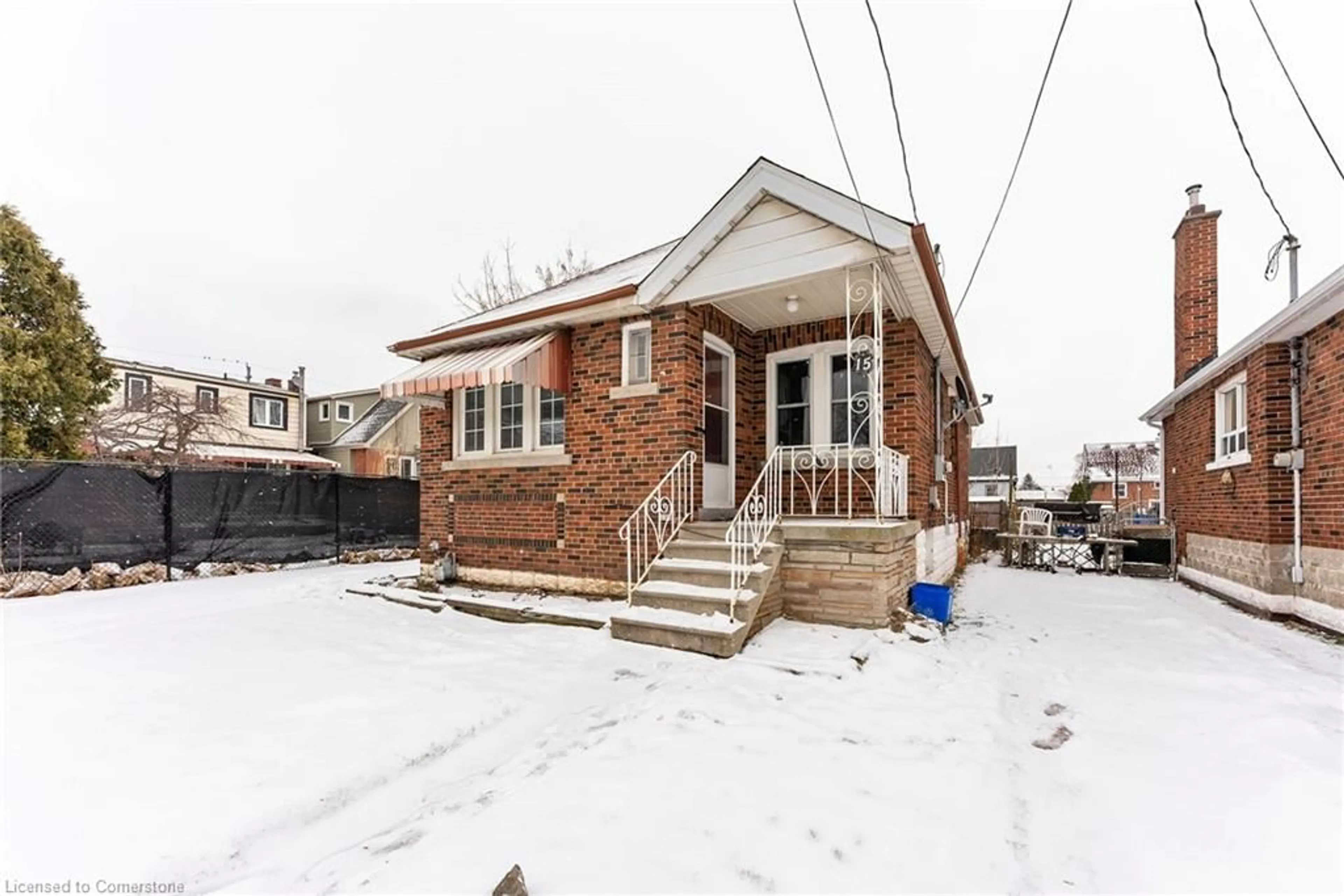 Home with brick exterior material, street for 15 East 12th St, Hamilton Ontario L9A 3X2