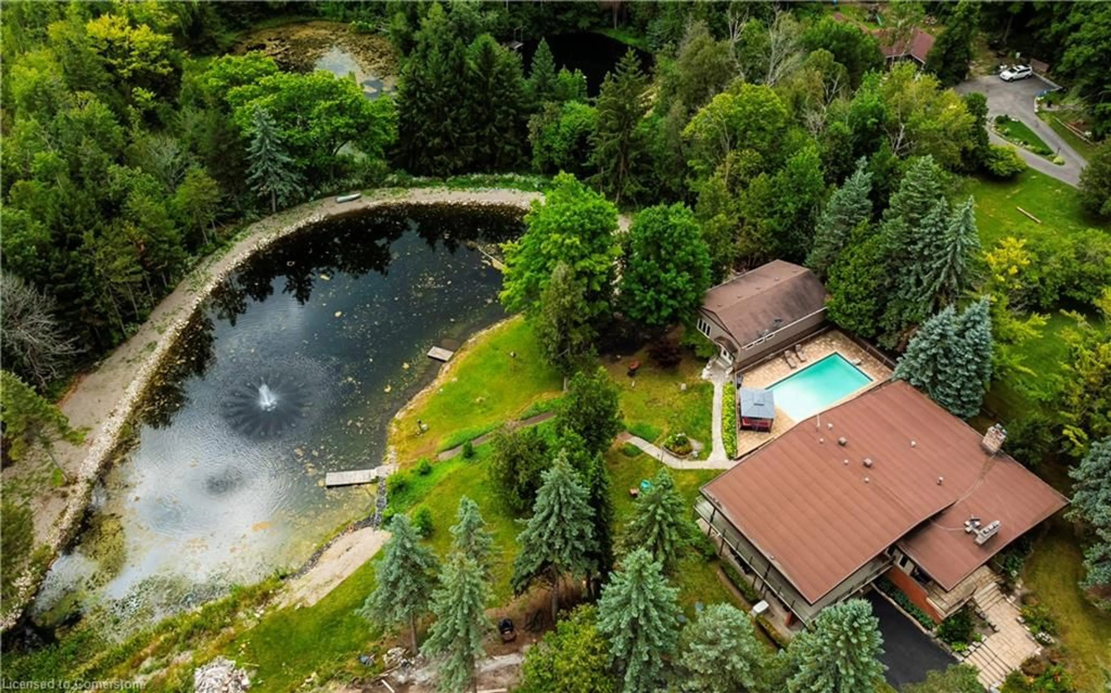 A pic from outside/outdoor area/front of a property/back of a property/a pic from drone, water/lake/river/ocean view for 16 Cedar Dr, Caledon Ontario L7K 1H8