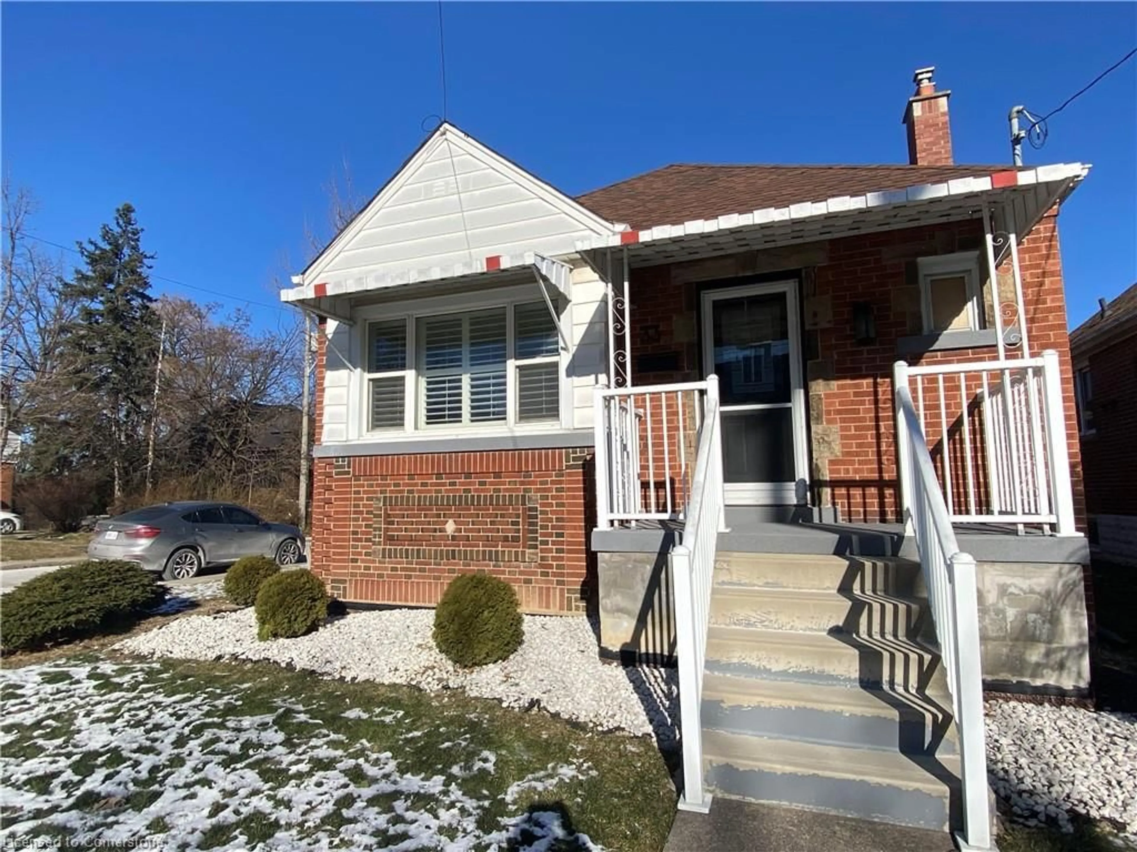 Home with brick exterior material, street for 33 Brucedale Ave, Hamilton Ontario L9A 1N1