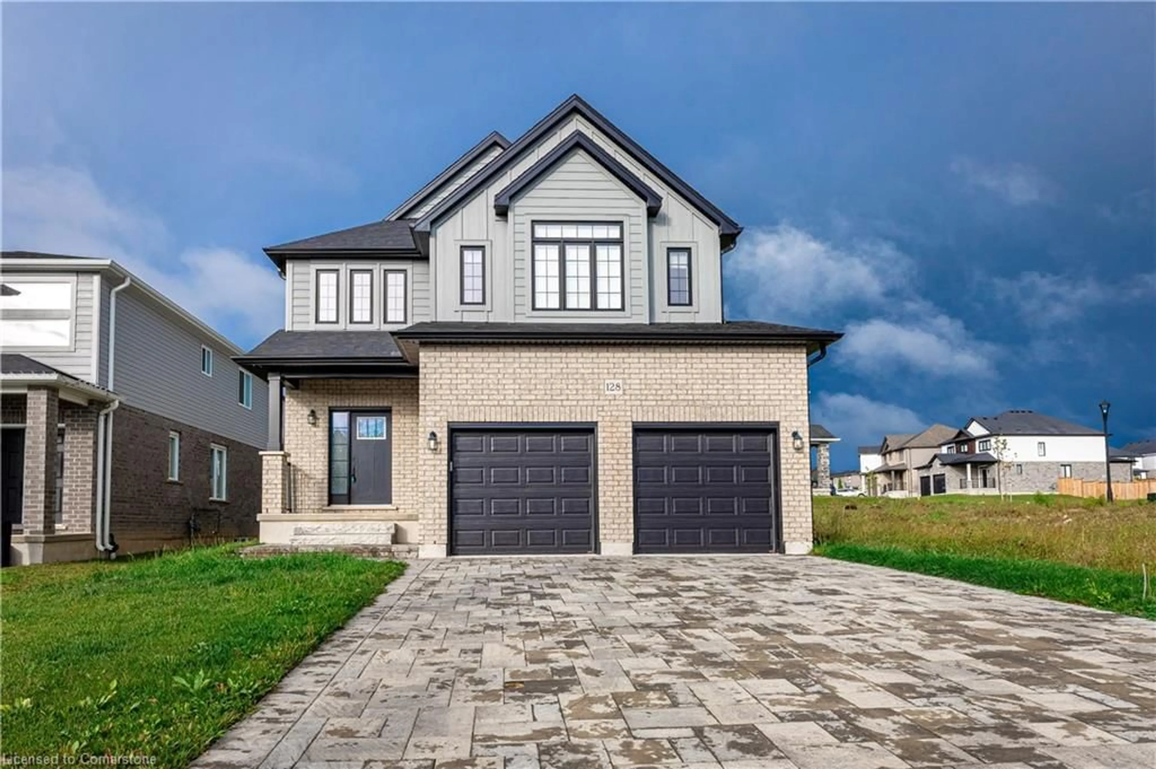 Home with brick exterior material, street for 128 Basil Cres, Ilderton Ontario N0M 2A0