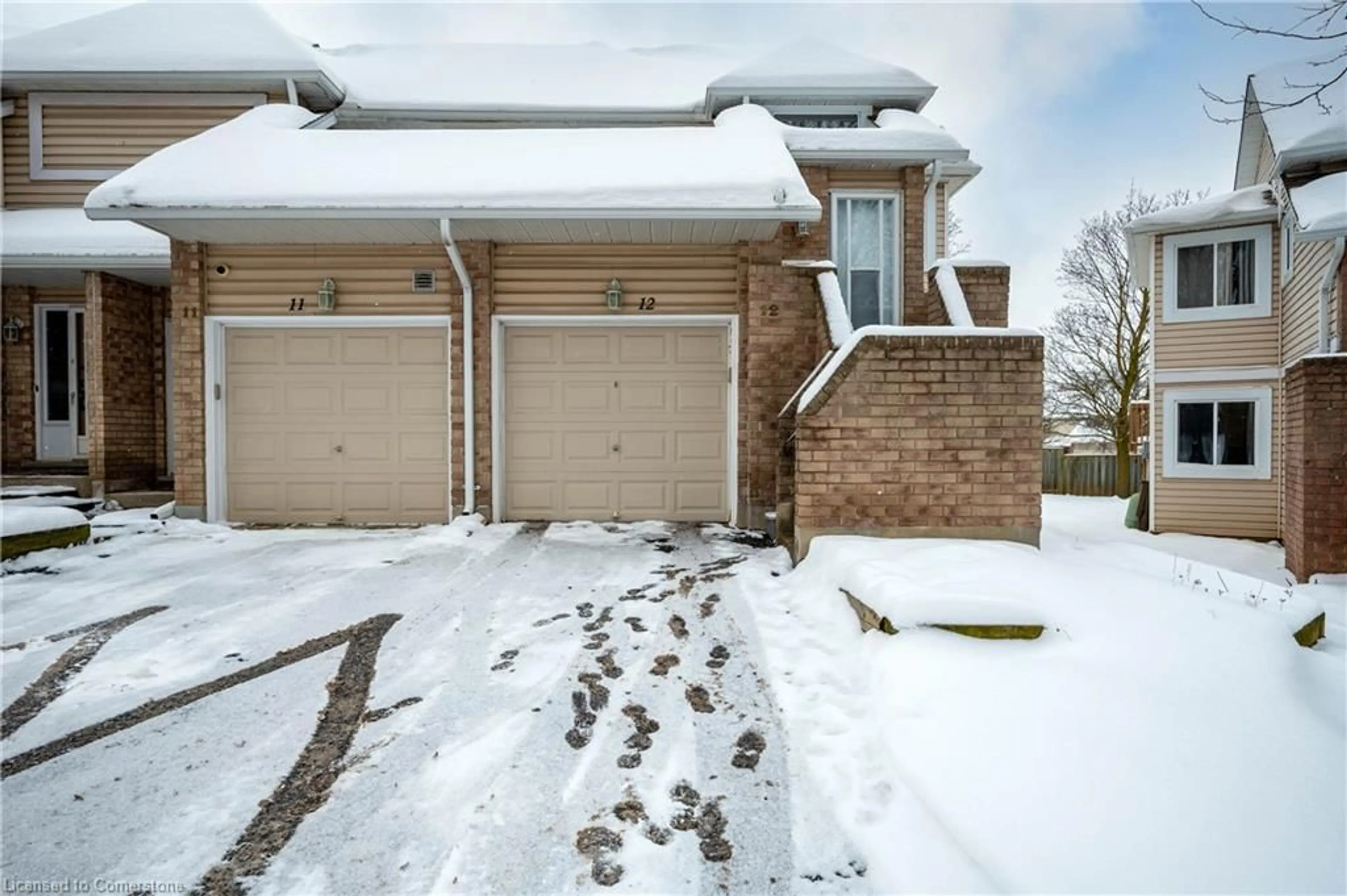 A pic from outside/outdoor area/front of a property/back of a property/a pic from drone, street for 205 Highland Cres #12, Kitchener Ontario N2M 5L6