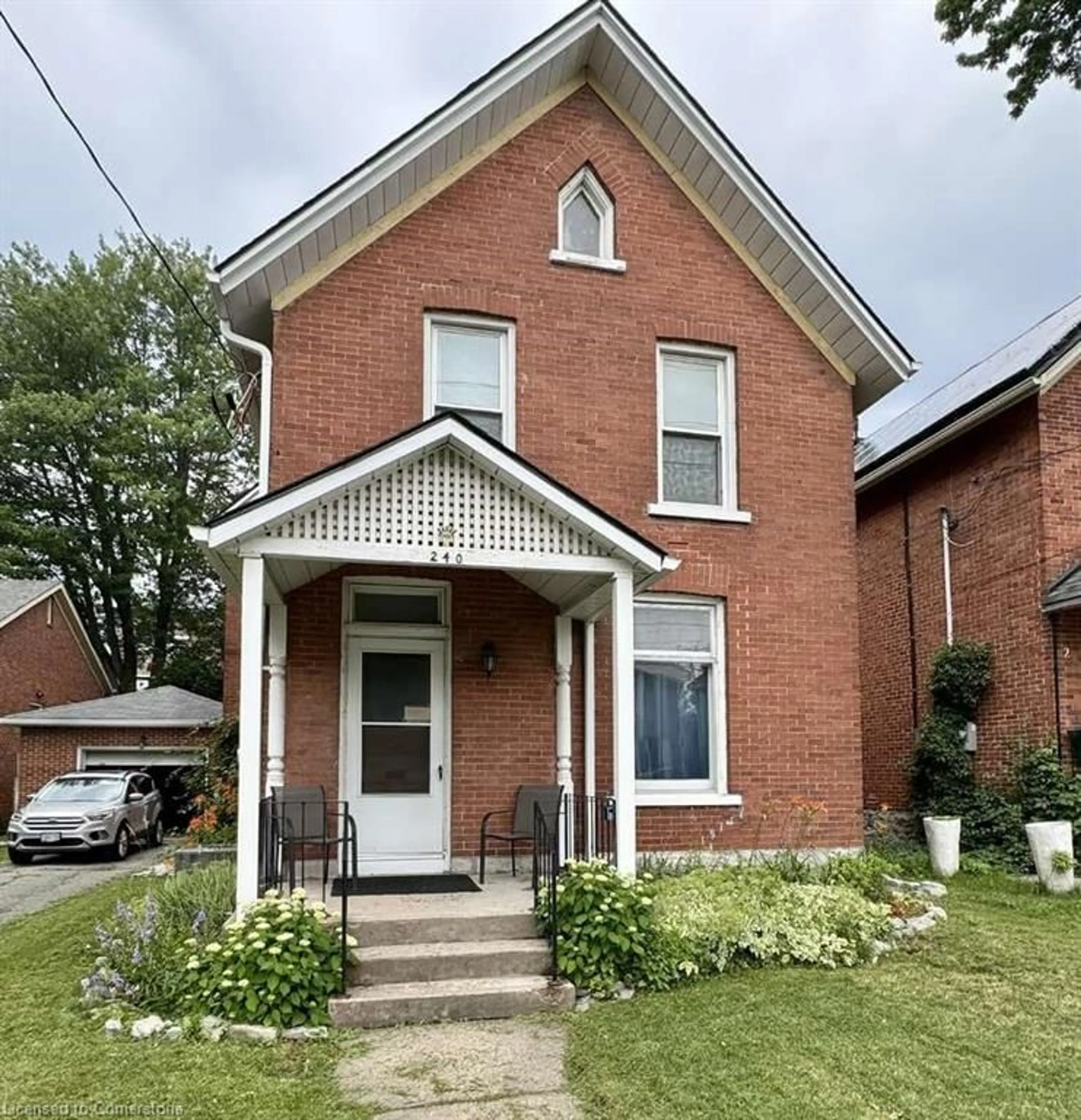 Home with brick exterior material, street for 240 Nelson St, Kingston Ontario K7K 4M7