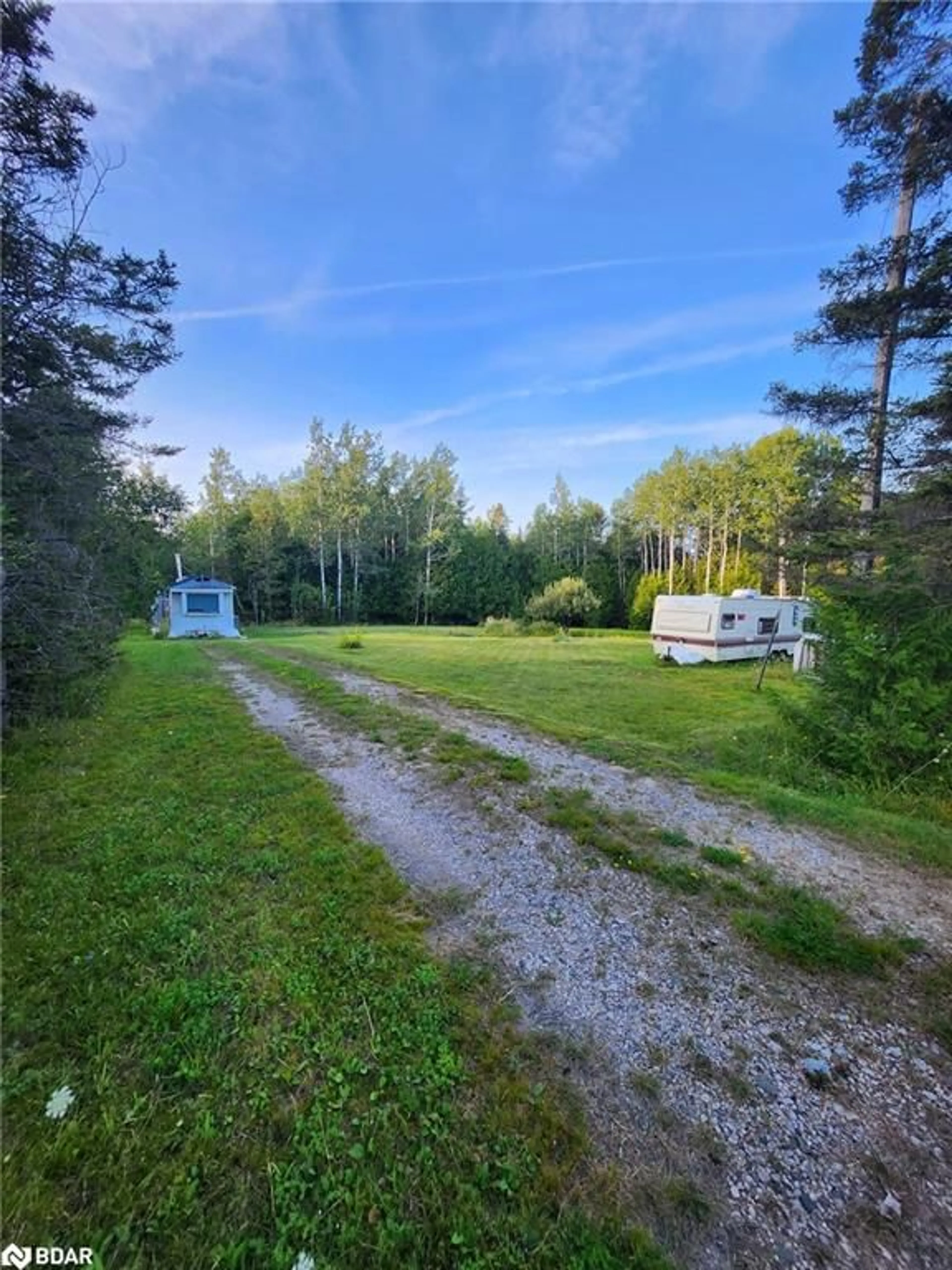 A pic from outside/outdoor area/front of a property/back of a property/a pic from drone, forest/trees view for 20250 Hwy 540, Silver Water Ontario P0P 1H0