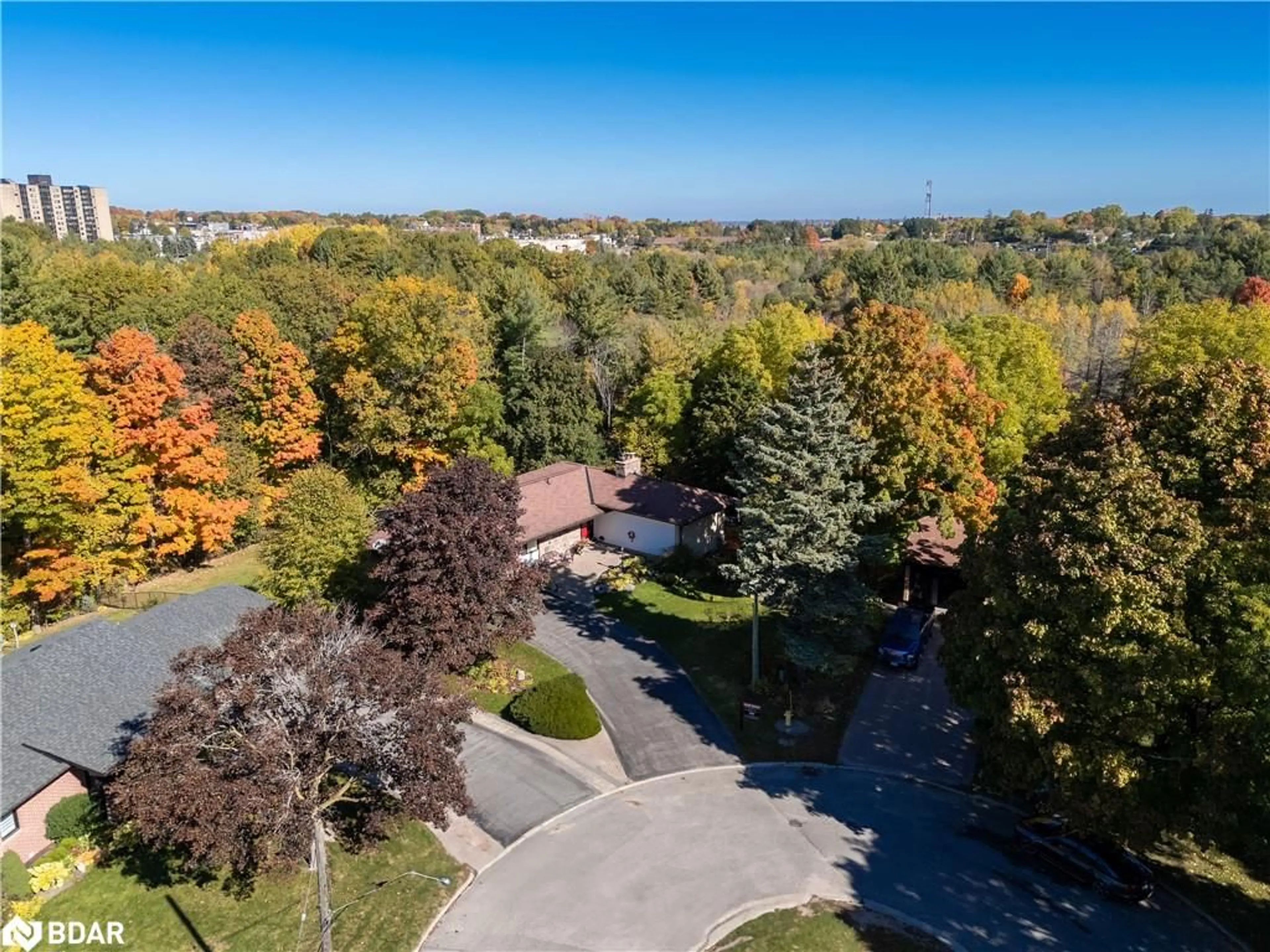 A pic from outside/outdoor area/front of a property/back of a property/a pic from drone, forest/trees view for 4 Brookdale Drive, Barrie Ontario L4N 1N5