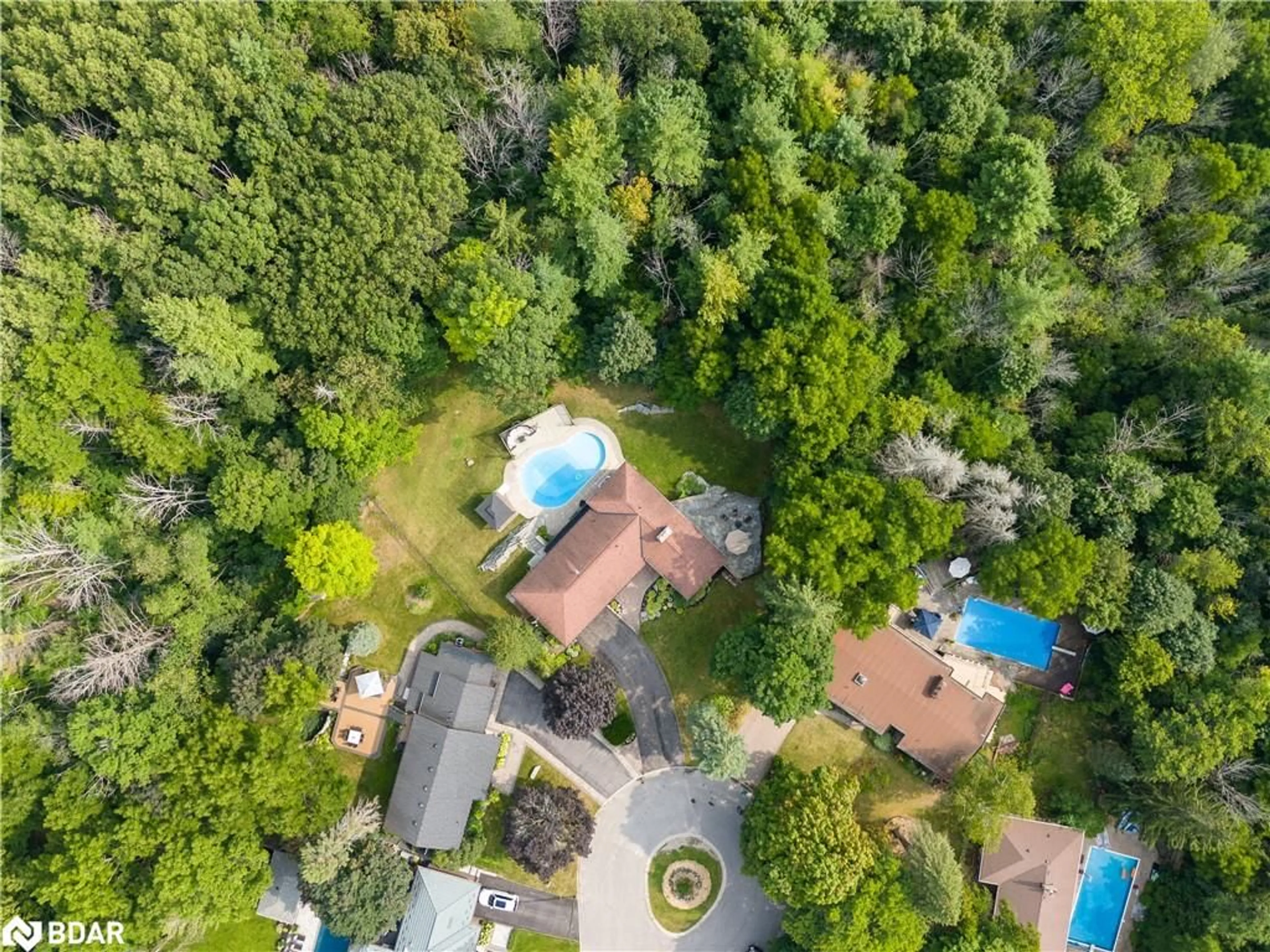 A pic from outside/outdoor area/front of a property/back of a property/a pic from drone, forest/trees view for 4 Brookdale Drive, Barrie Ontario L4N 1N5