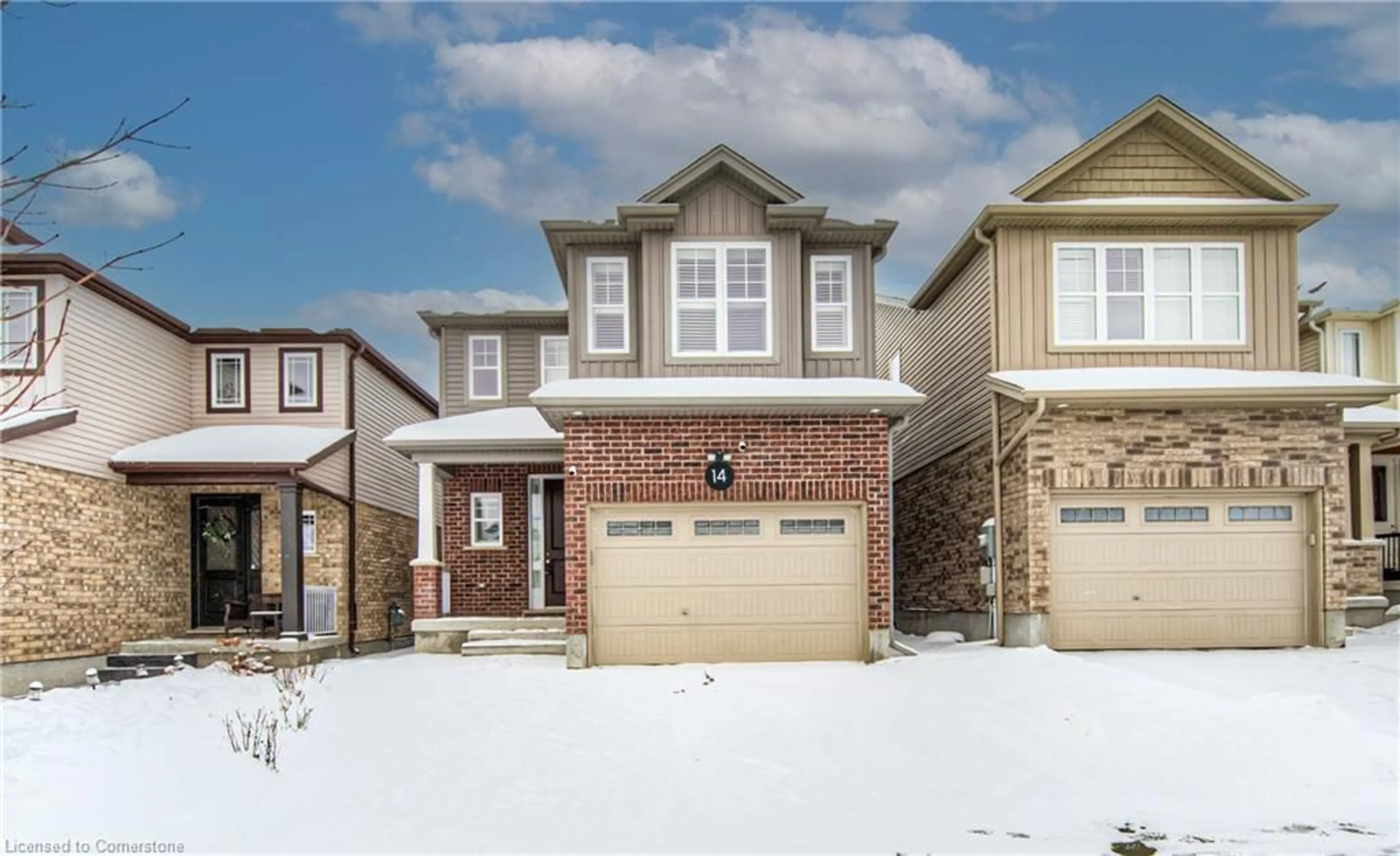 Home with brick exterior material, street for 14 Willowrun Dr, Kitchener Ontario N2A 0H5