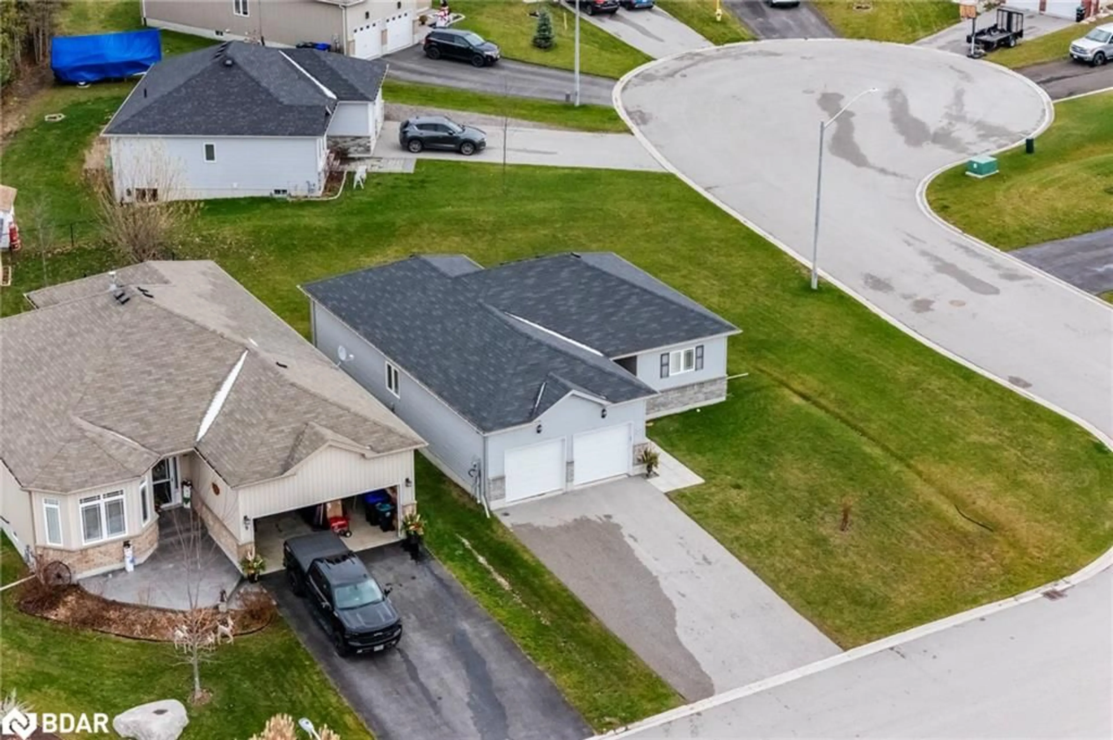 A pic from outside/outdoor area/front of a property/back of a property/a pic from drone, street for 11 Charlie Rawson Blvd, Victoria Harbour Ontario L0K 2A0