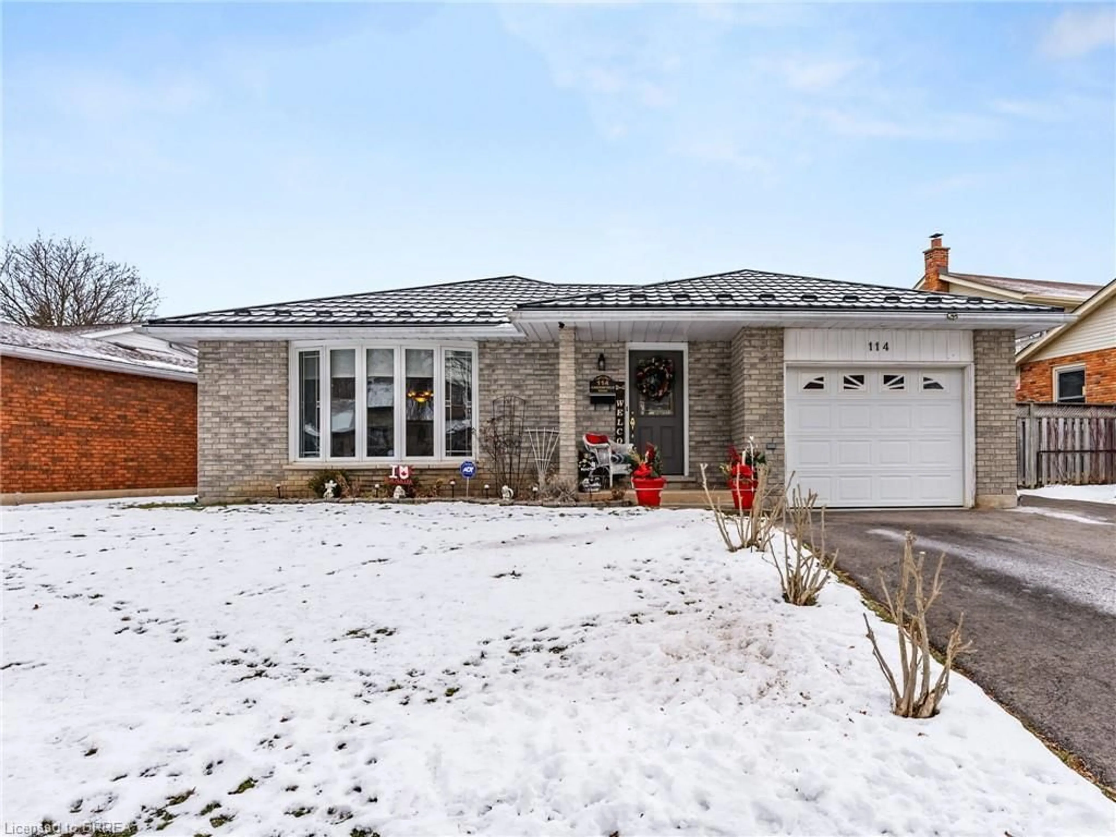 Home with brick exterior material, street for 114 Greenfield Rd, Brantford Ontario N3R 7C8