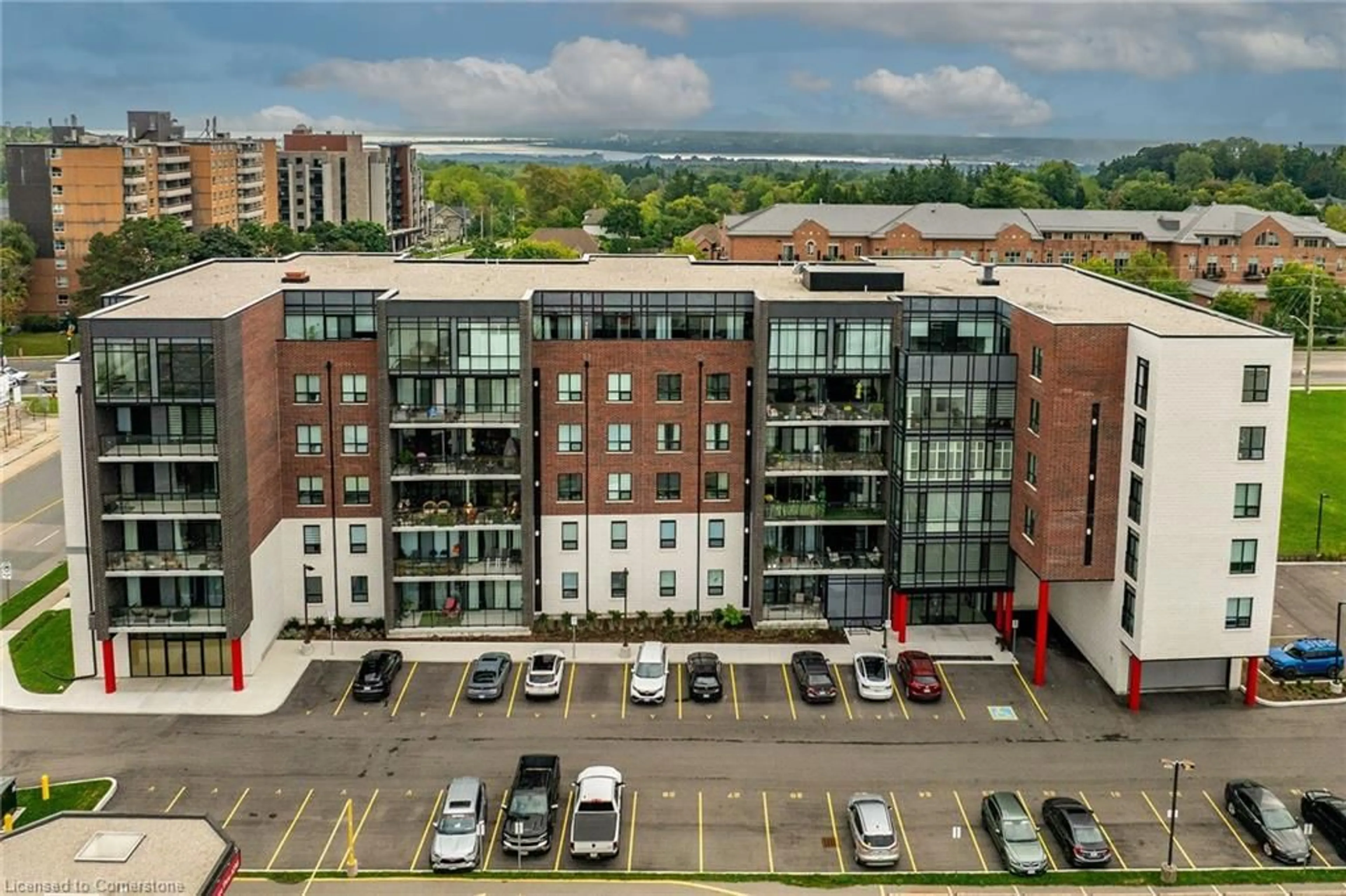 A pic from outside/outdoor area/front of a property/back of a property/a pic from drone, building for 5 Hamilton St #212, Waterdown Ontario L8B 2A4