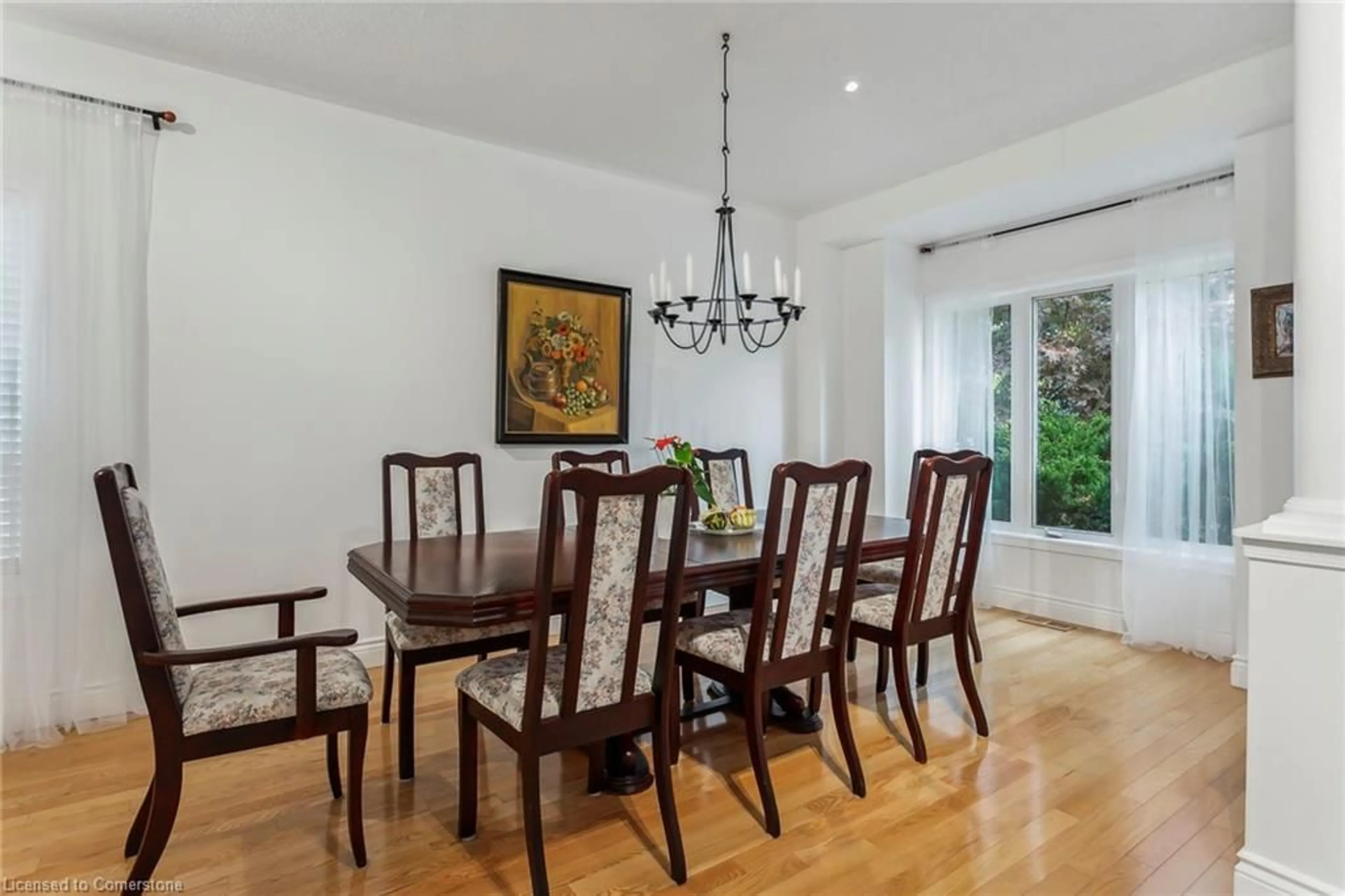 Dining room, wood/laminate floor for 491 Pettit Trail, Milton Ontario L9T 6N9