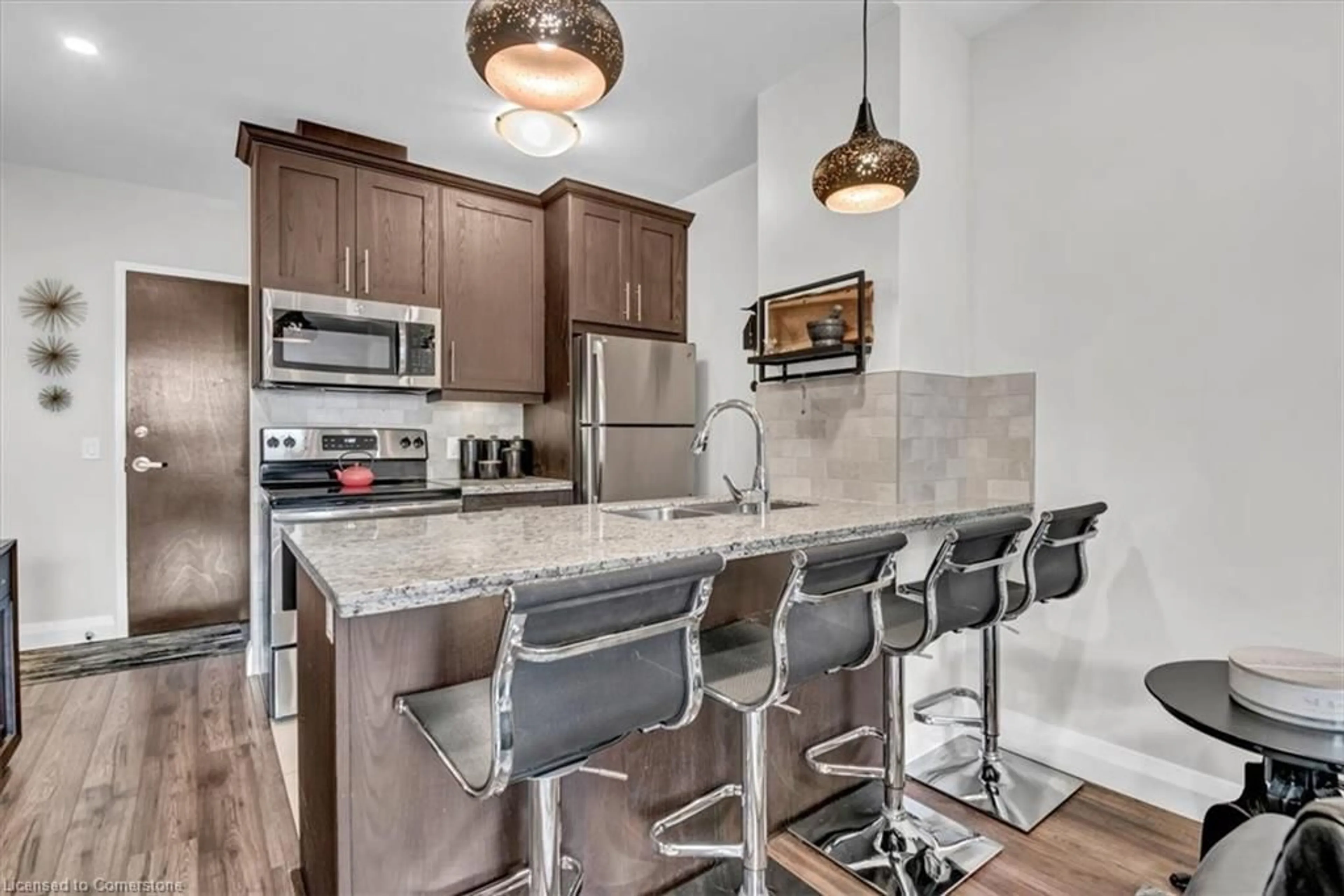 Open concept kitchen, ceramic/tile floor for 118 King St #1118, Hamilton Ontario L8N 0A9