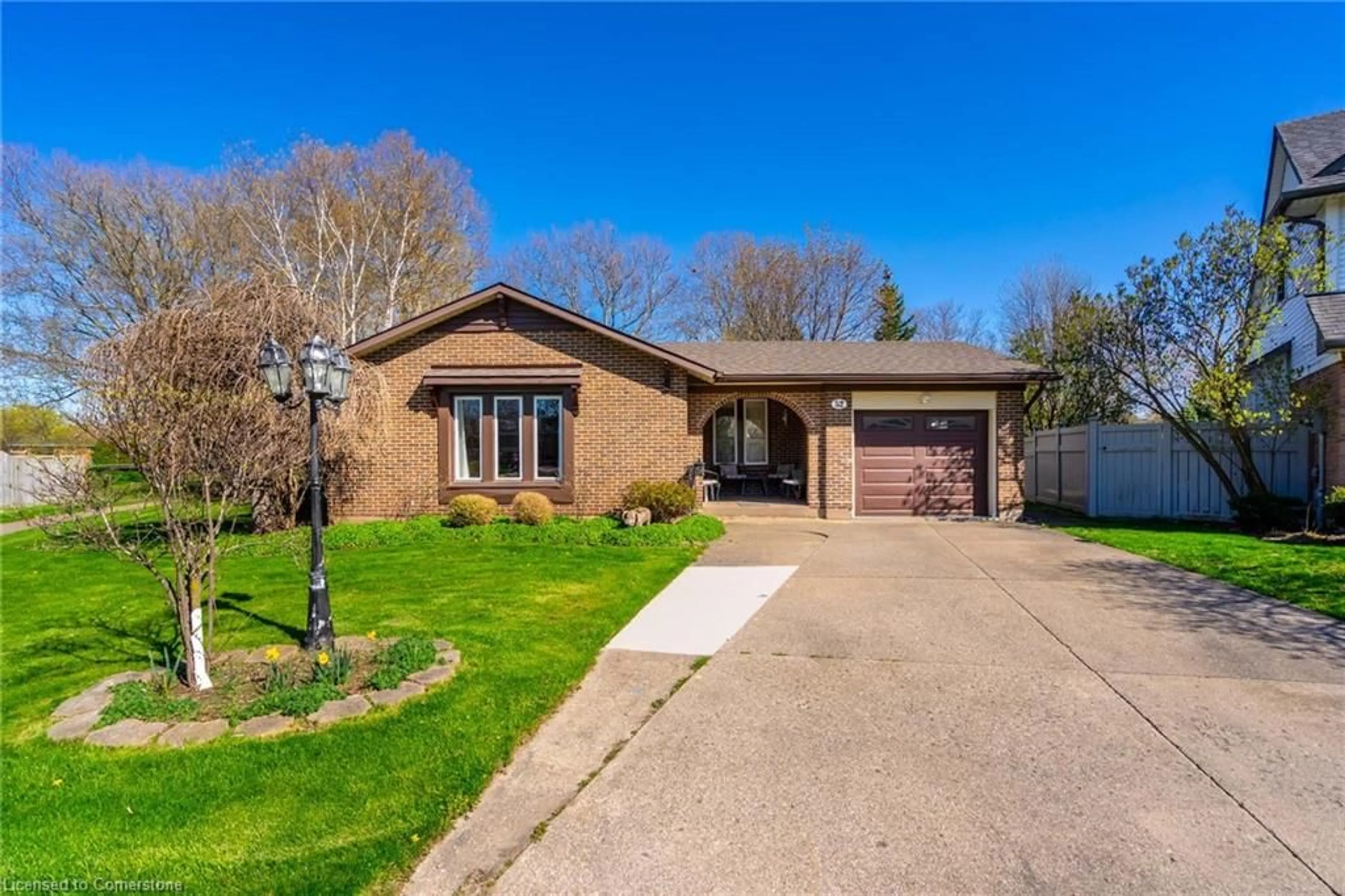 Home with brick exterior material, street for 52 Greenmeadow Crt, St. Catharines Ontario L2N 6Y7