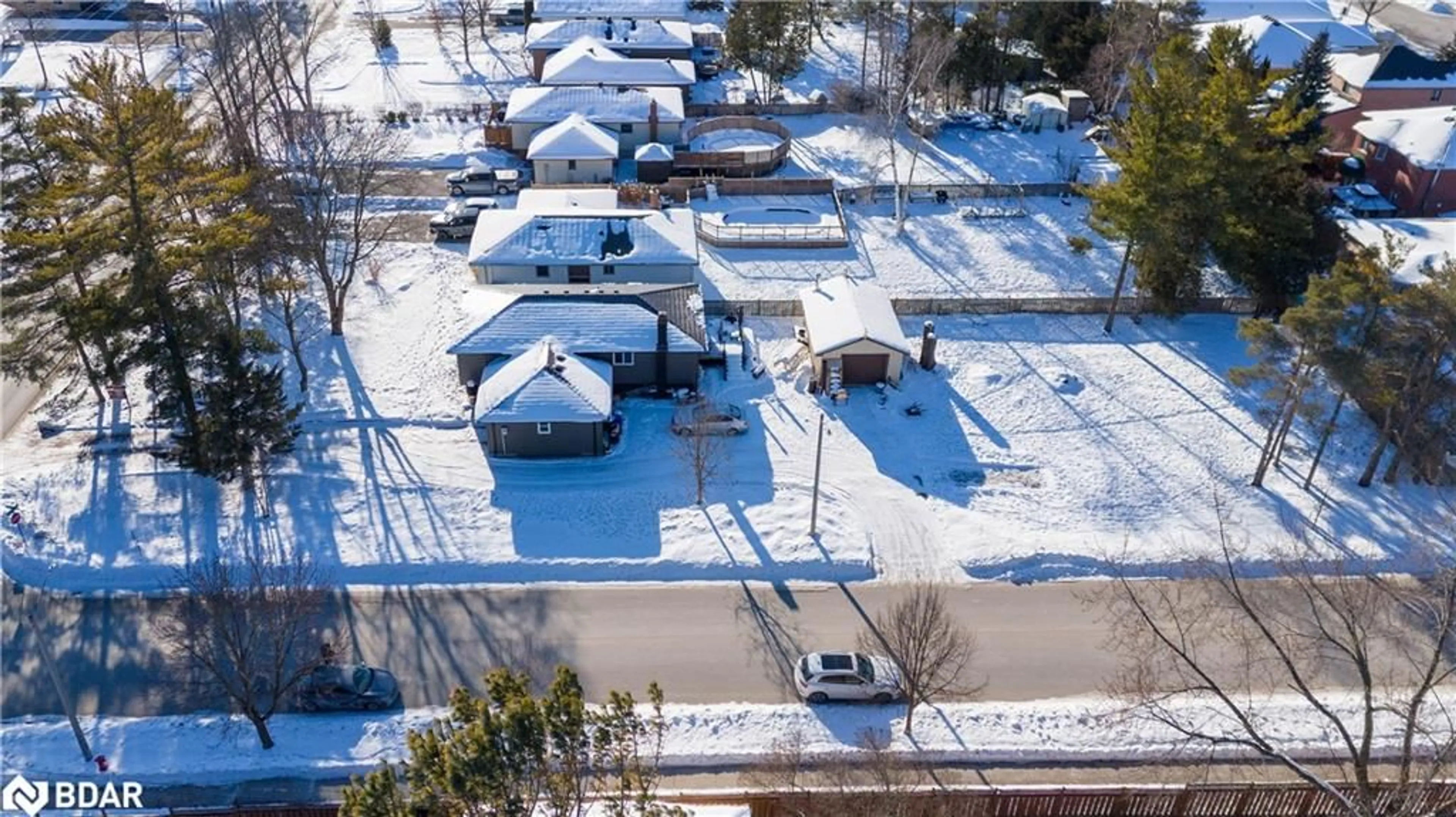 A pic from outside/outdoor area/front of a property/back of a property/a pic from drone, street for 2326 25 Sideroad Rd, Innisfil Ontario L9S 2G2